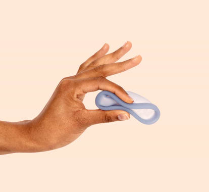 female hand pinching saalt disc