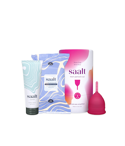 Menstrual care products including a tube, box, and pink menstrual cup with 'saalt' branding on a white background.