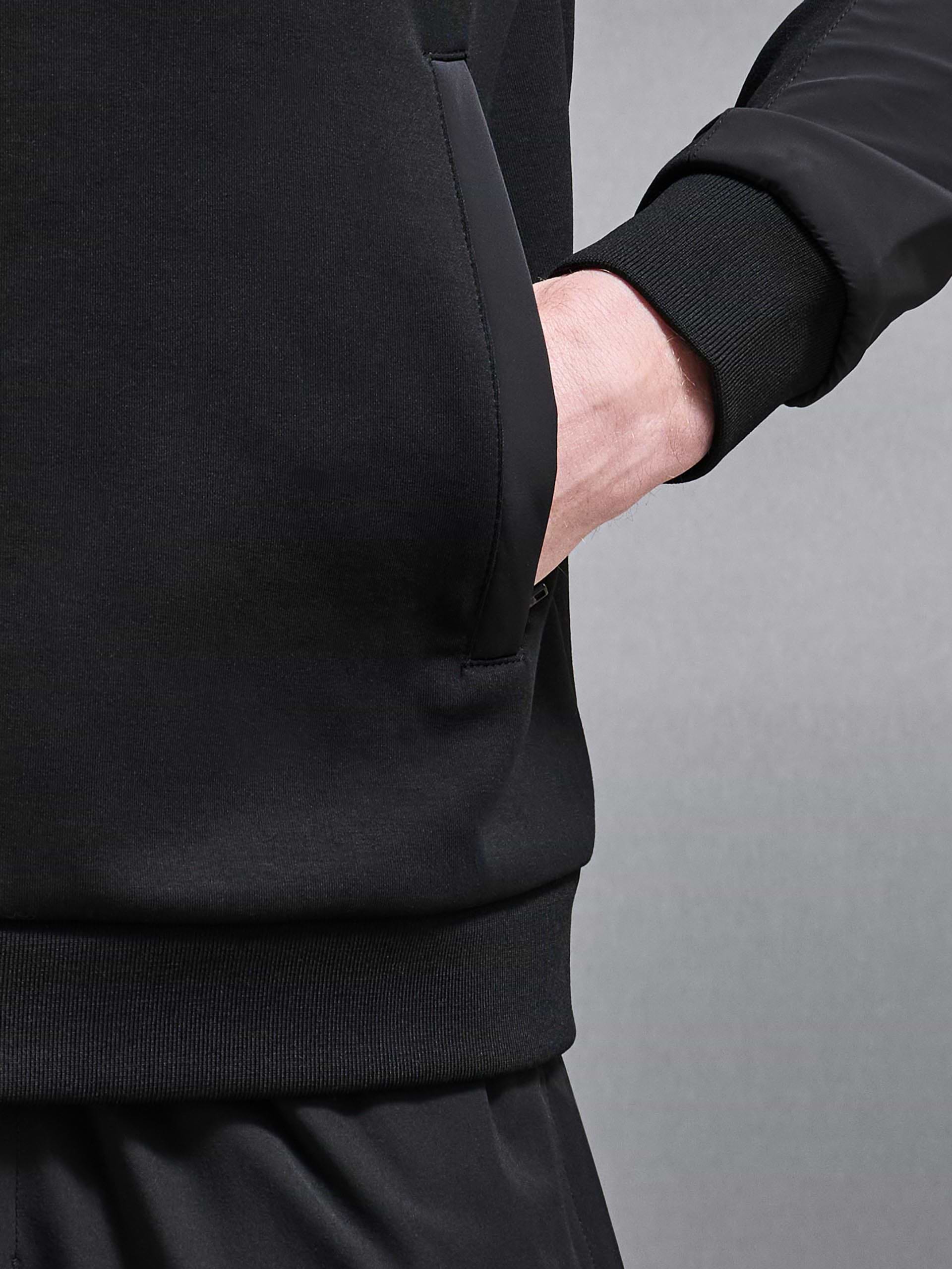 Apex Hybrid Jersey Windbreaker in Black