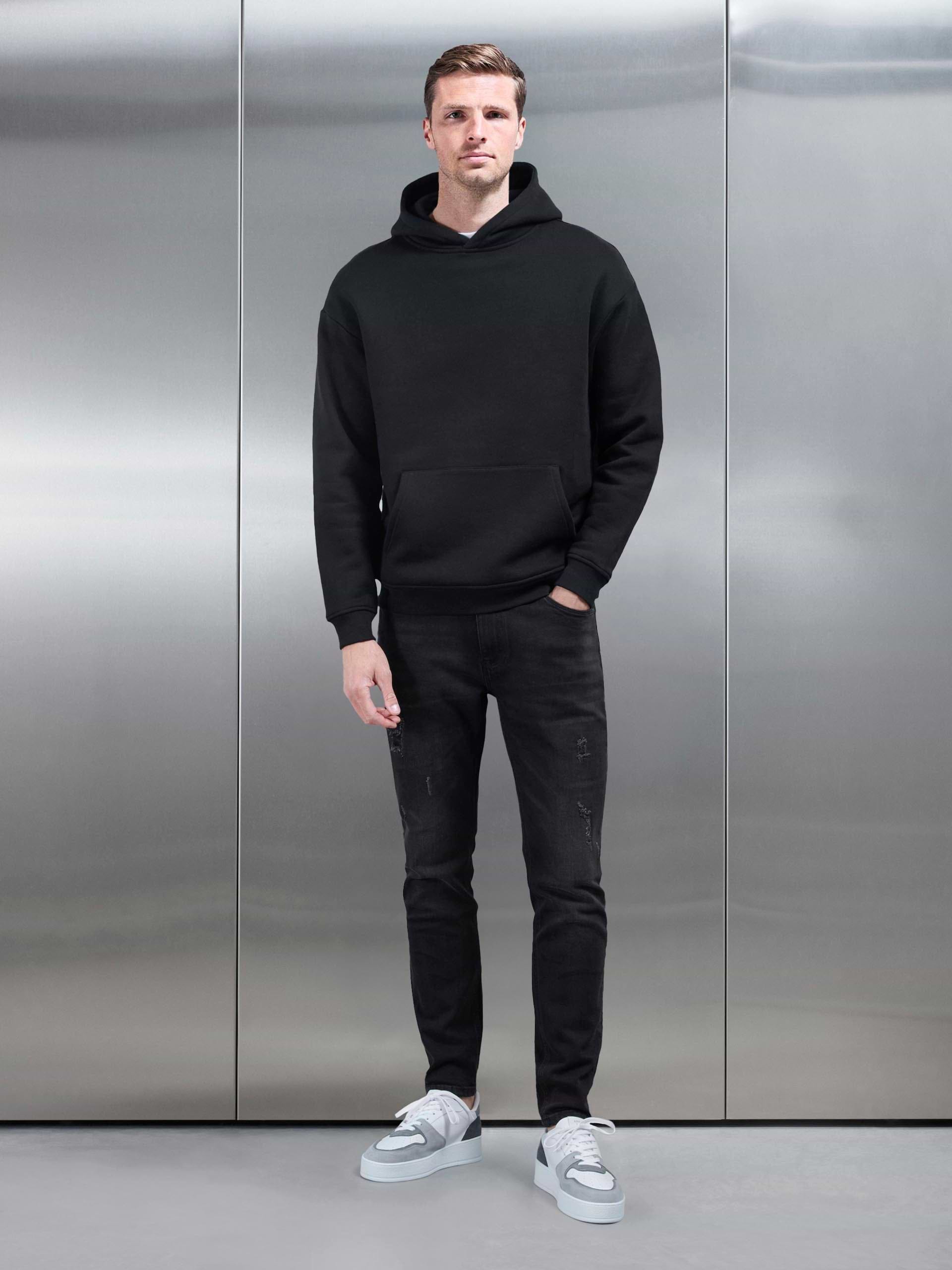 Distressed Slim Fit Denim Jeans in Black Wash