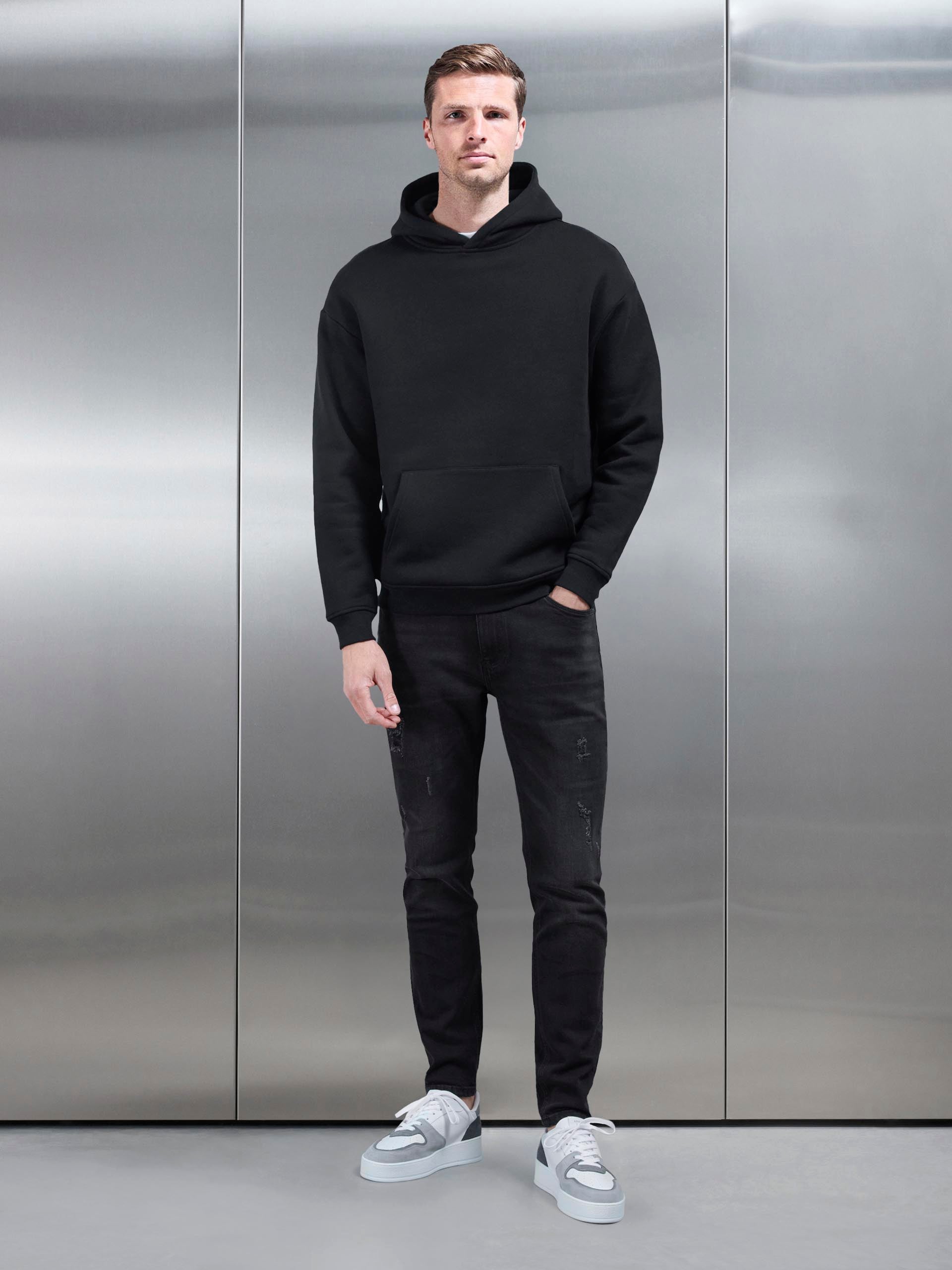 Distressed Slim Fit Denim Jeans in Black Wash