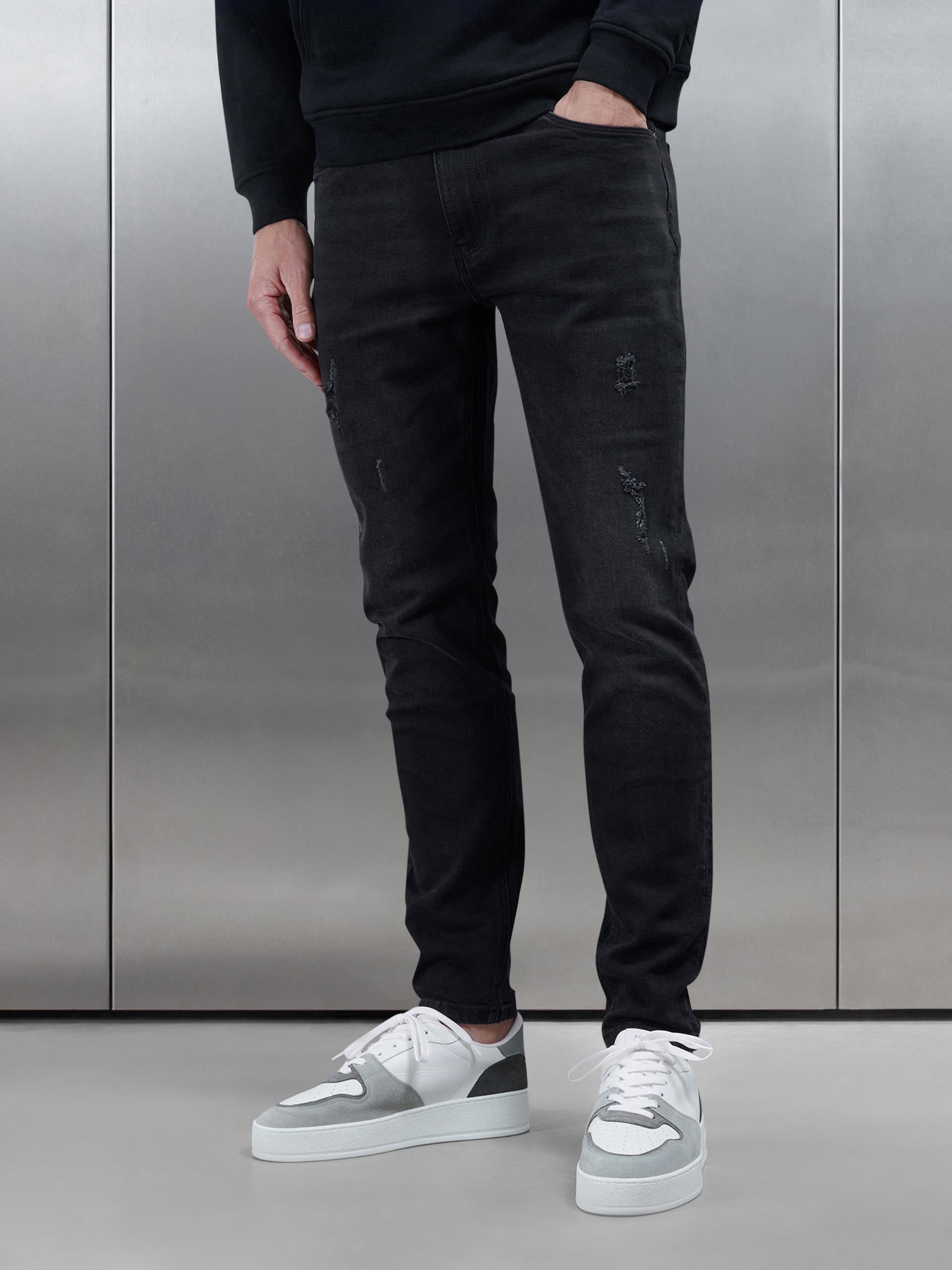 Distressed Slim Fit Denim Jeans in Black Wash