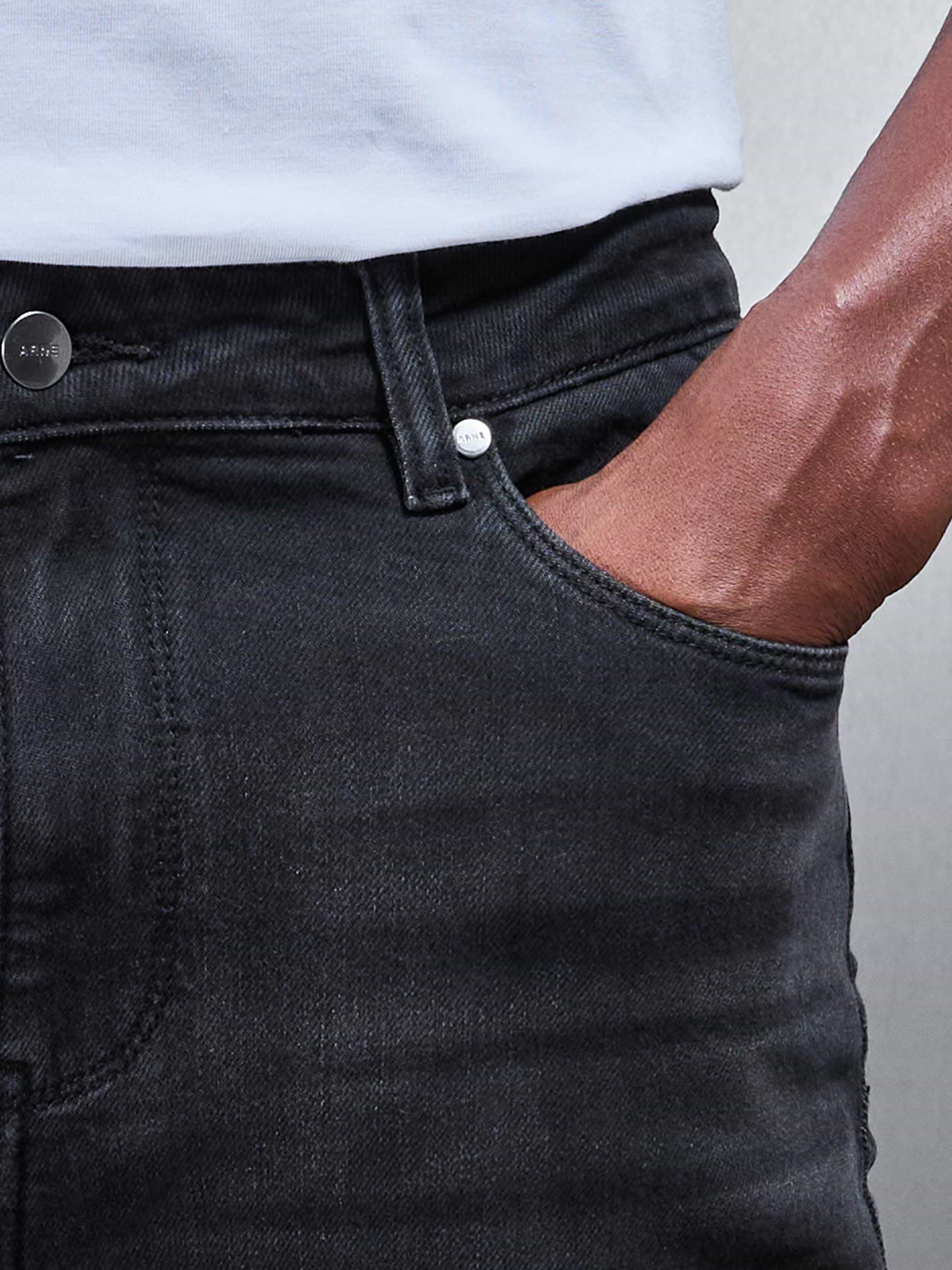 Distressed Denim Jeans in Black Wash