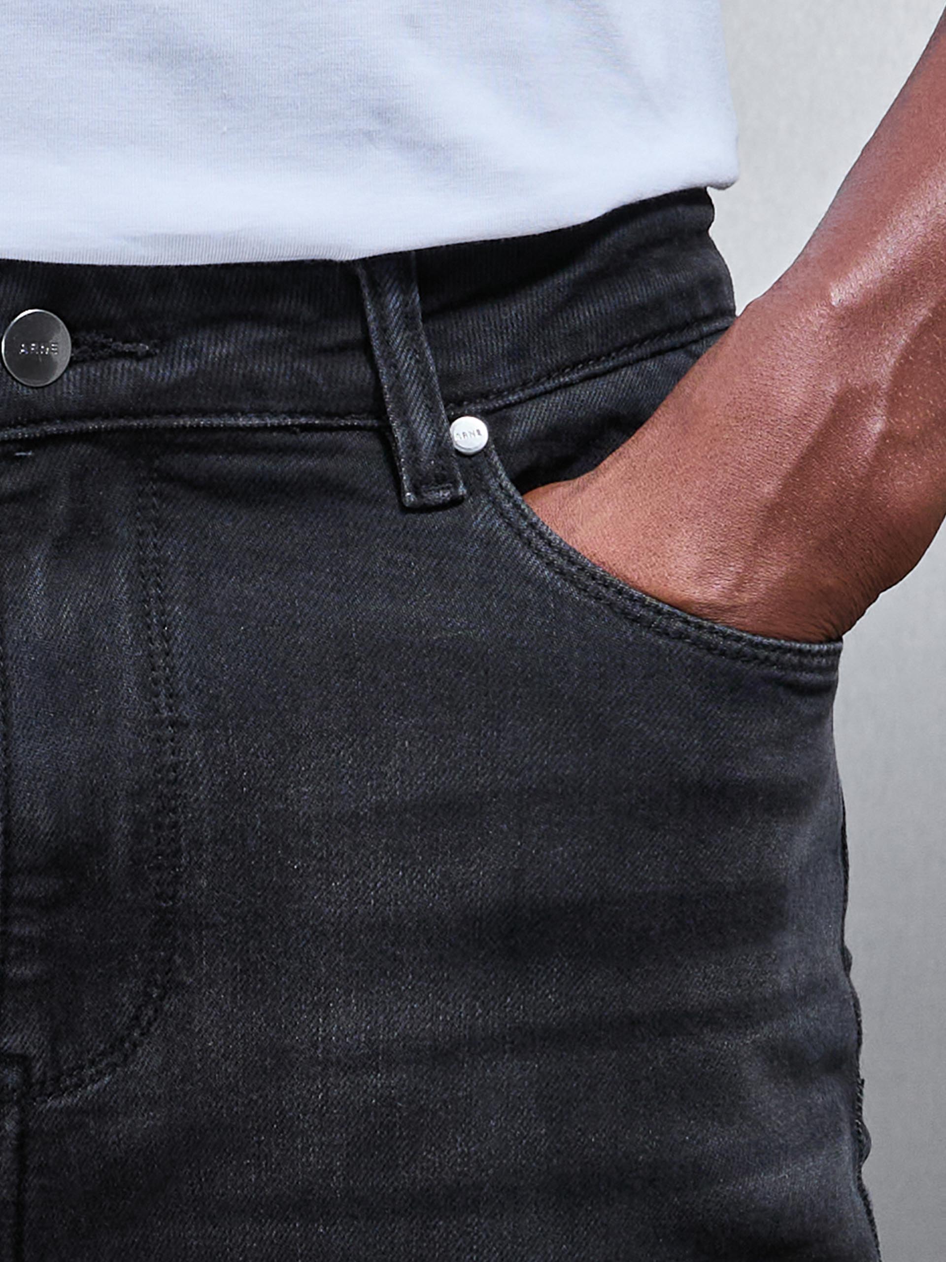 Distressed Denim Jeans in Black Wash