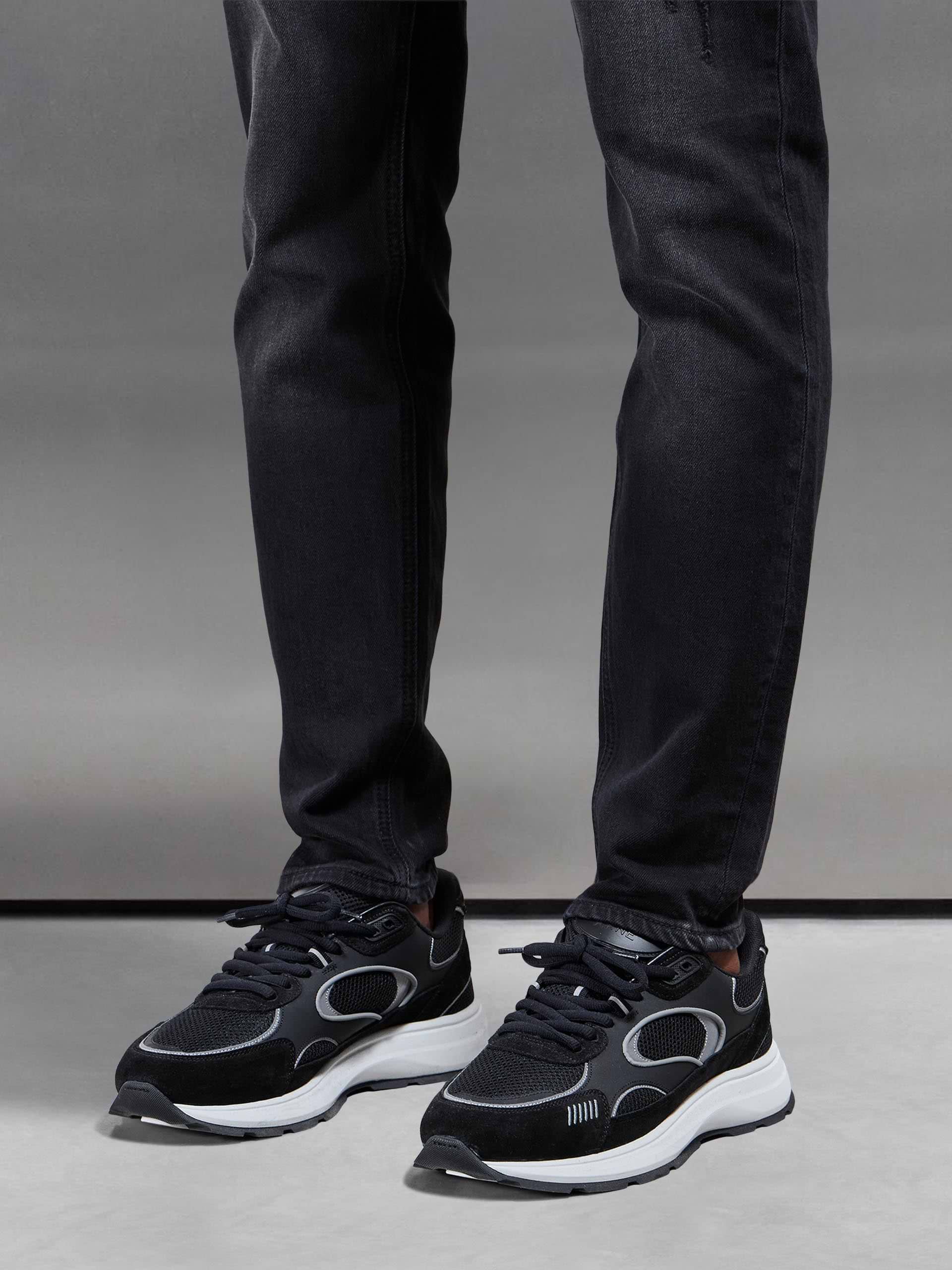 Distressed Denim Jeans in Black Wash