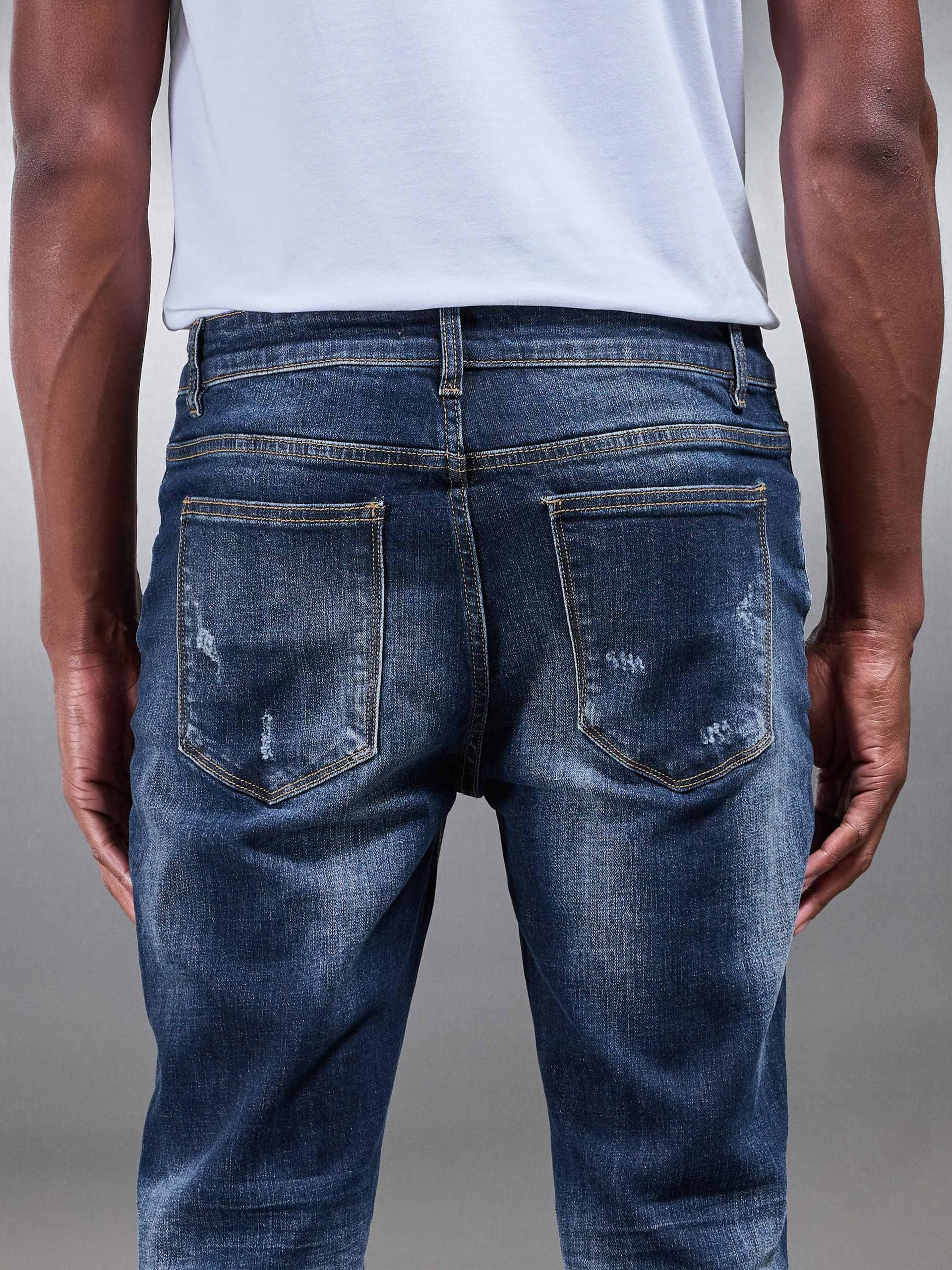 Distressed Denim Jeans in Dark Wash