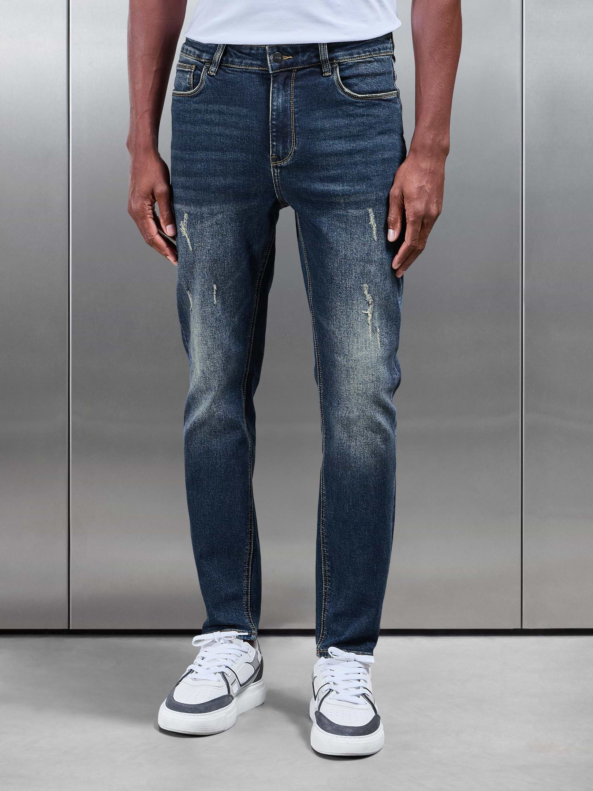 Distressed Denim Jeans in Vintage Blue