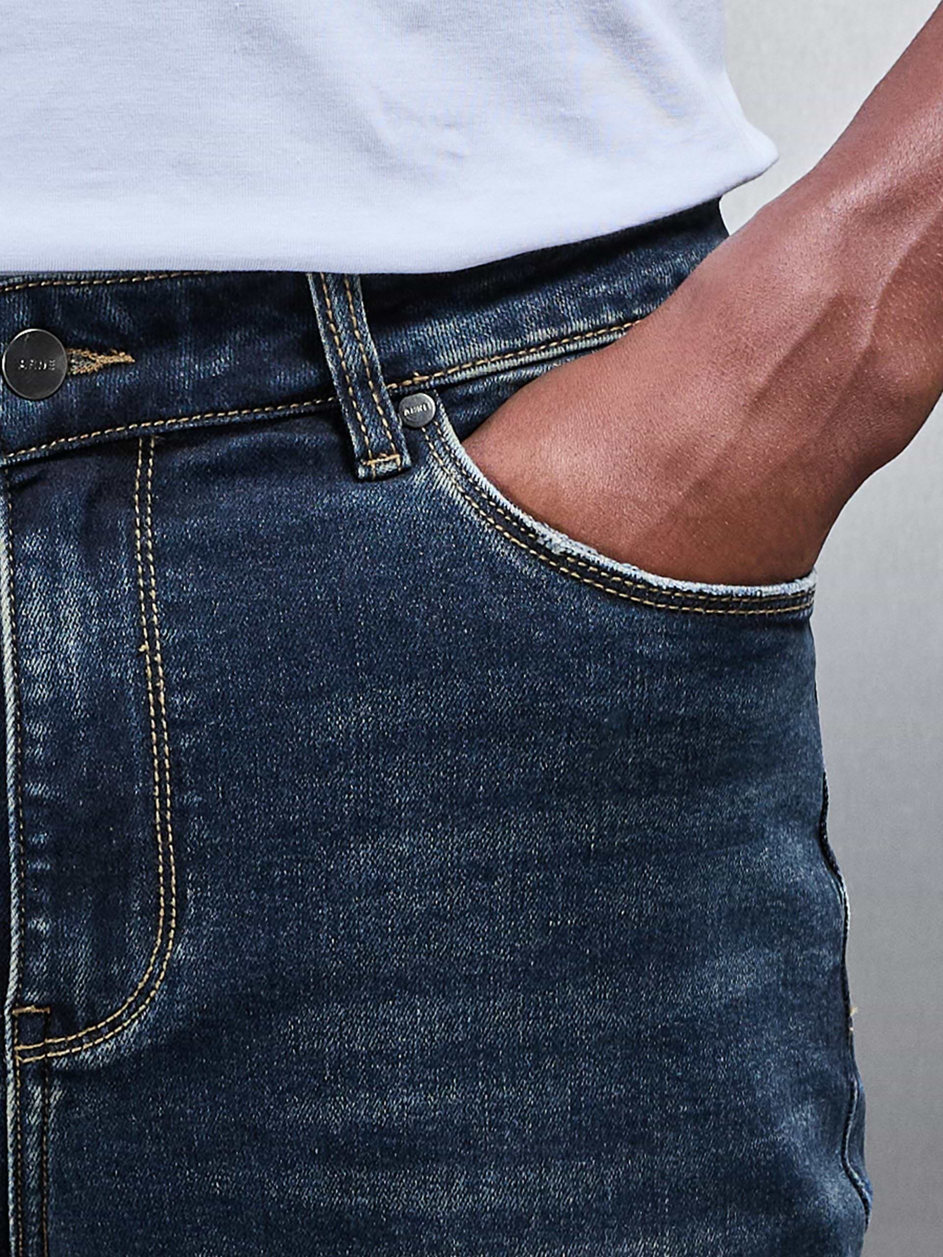 Distressed Denim Jeans in Vintage Blue