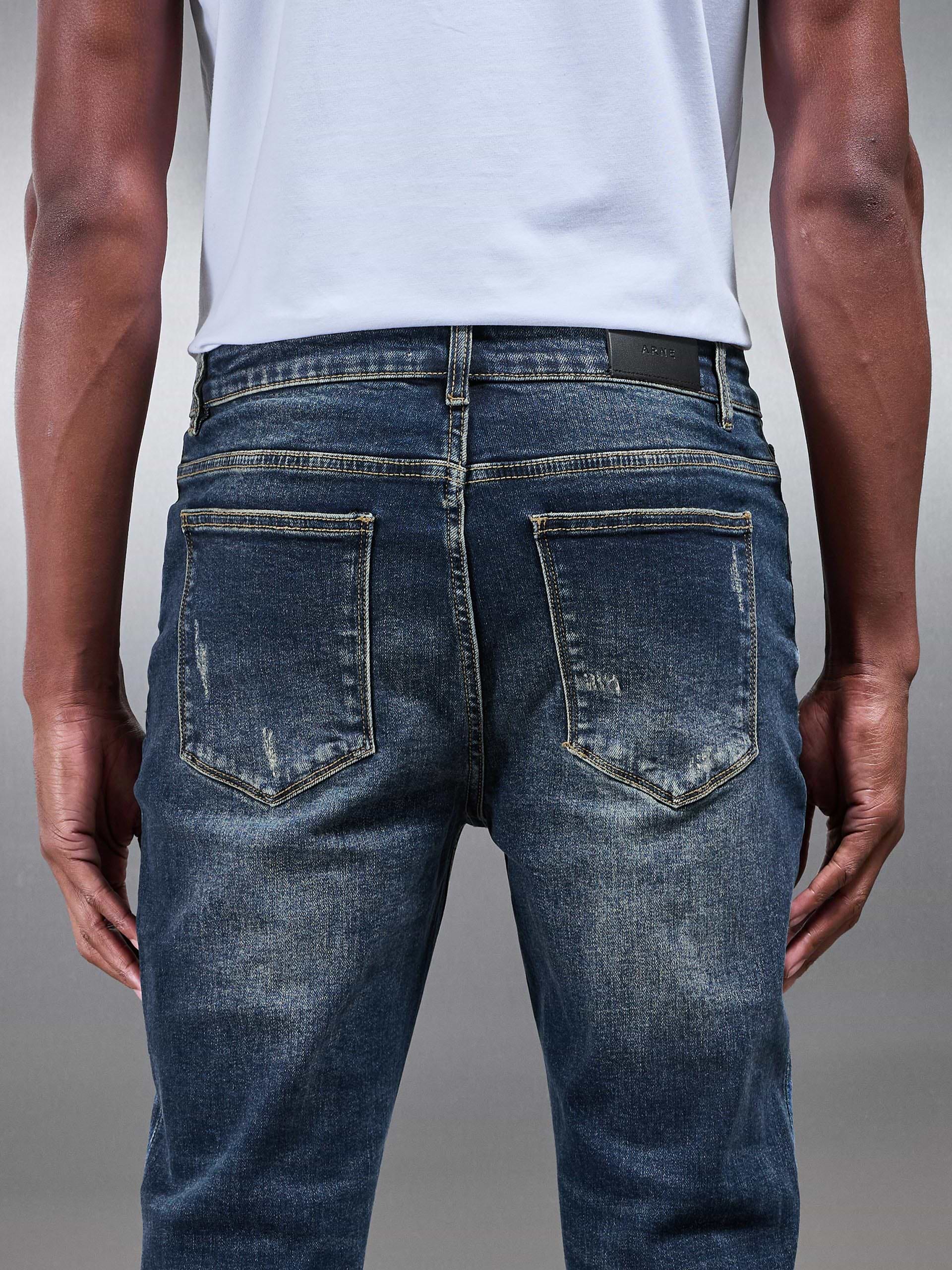 Distressed Denim Jeans in Vintage Blue