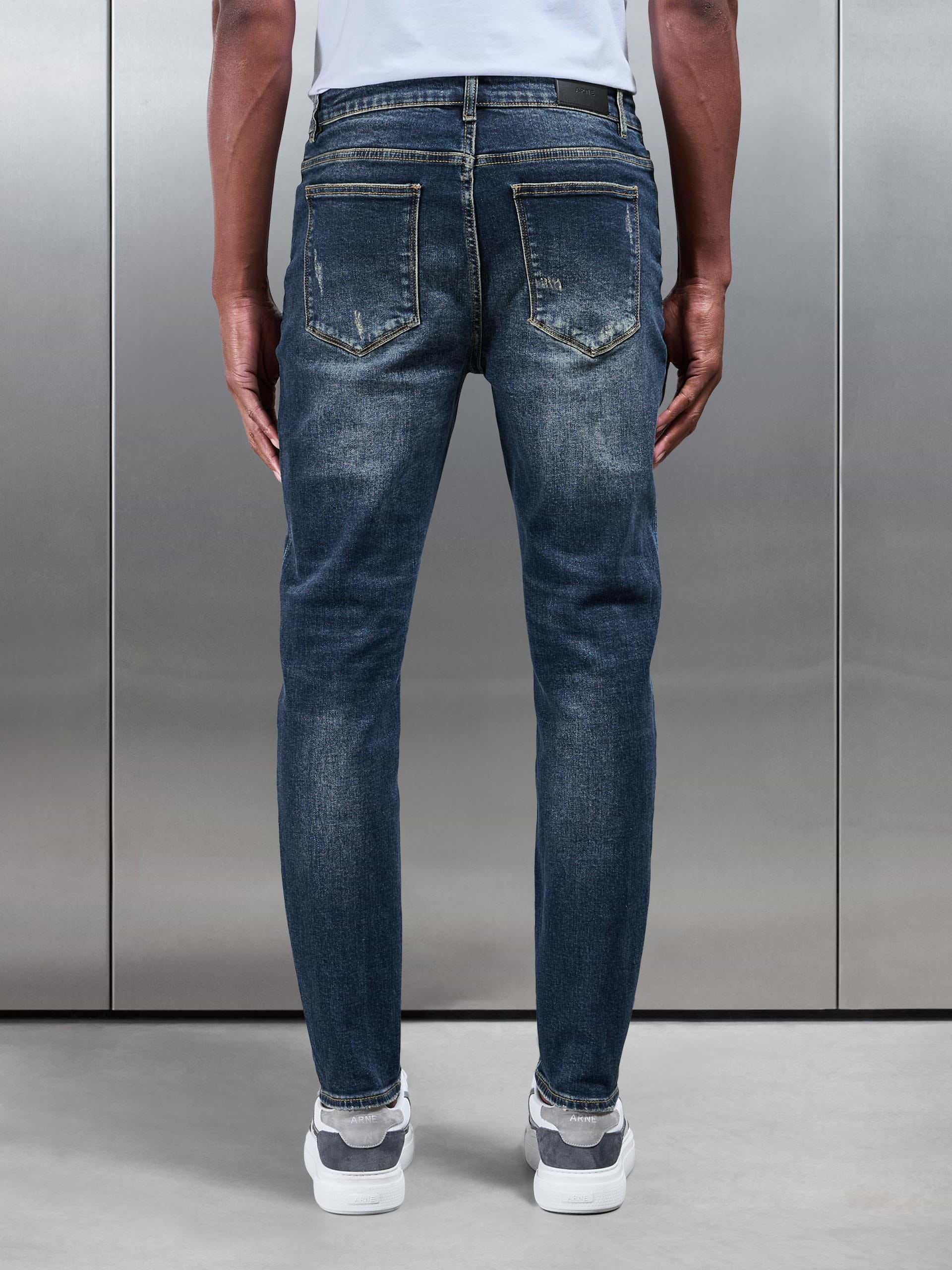 Distressed Denim Jeans in Vintage Blue