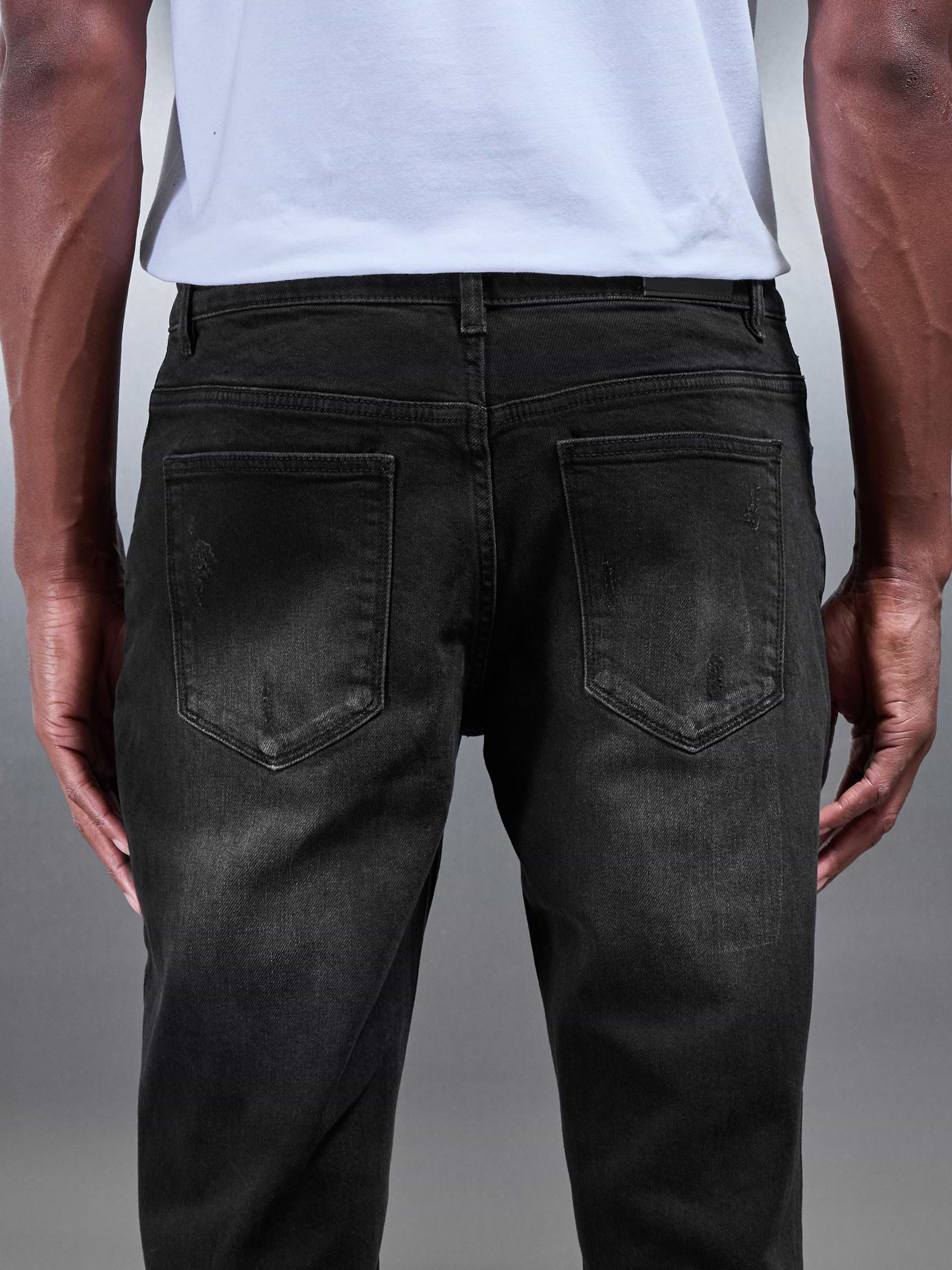 Distressed Straight Leg Denim Jeans in Black Wash