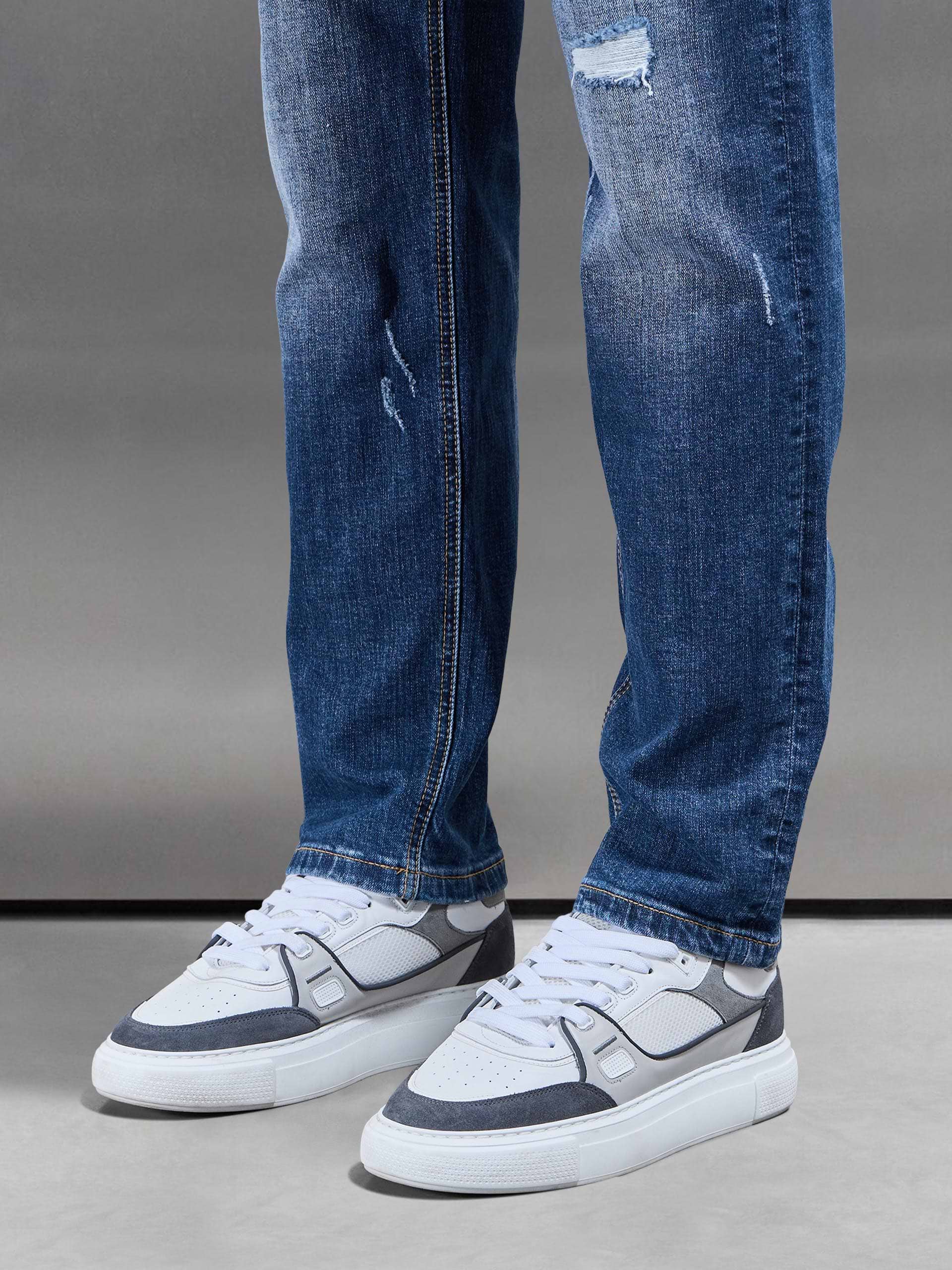 Distressed Straight Leg Denim Jeans in Mid Blue
