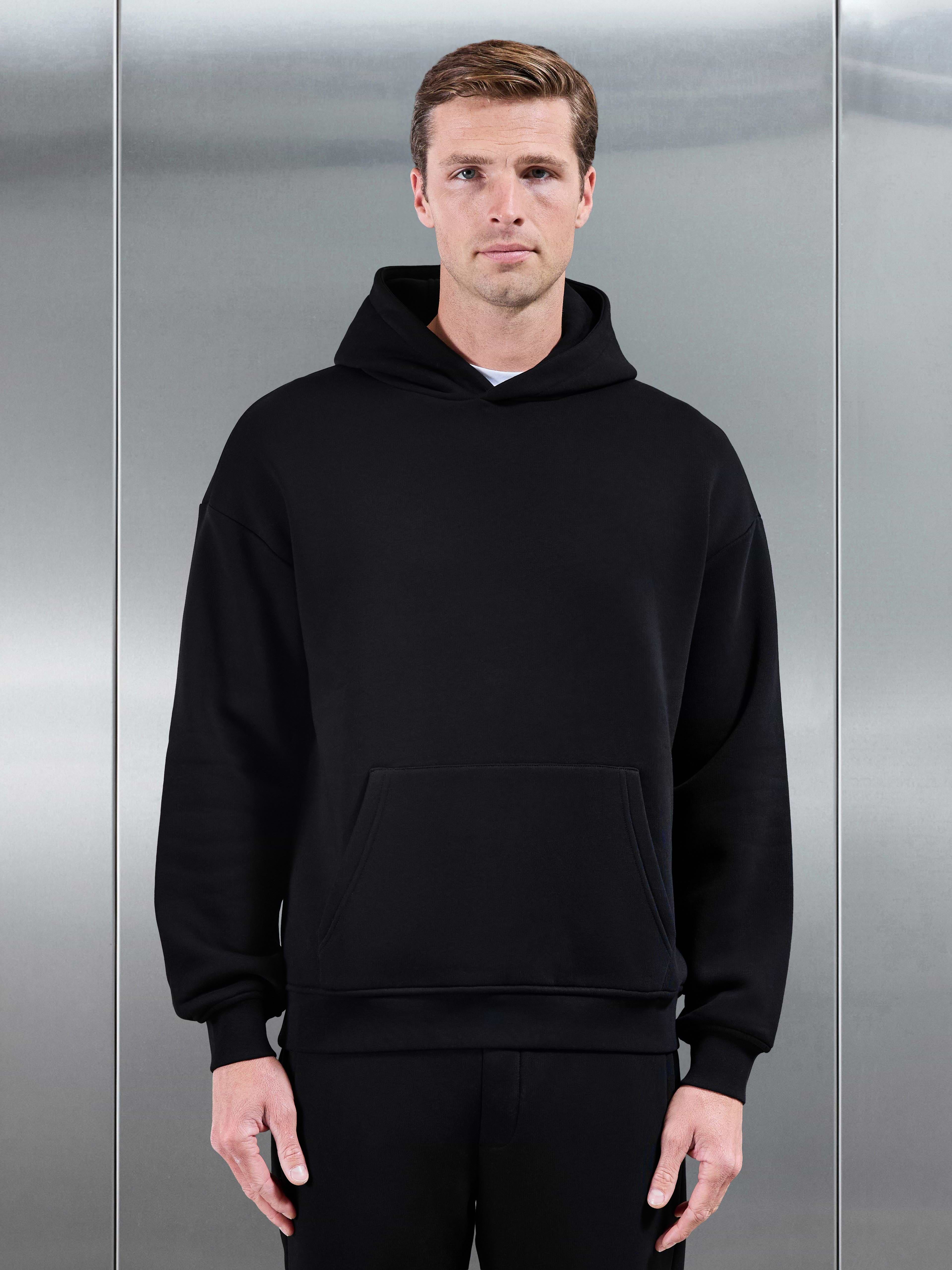 Essential Relaxed Hoodie in Black