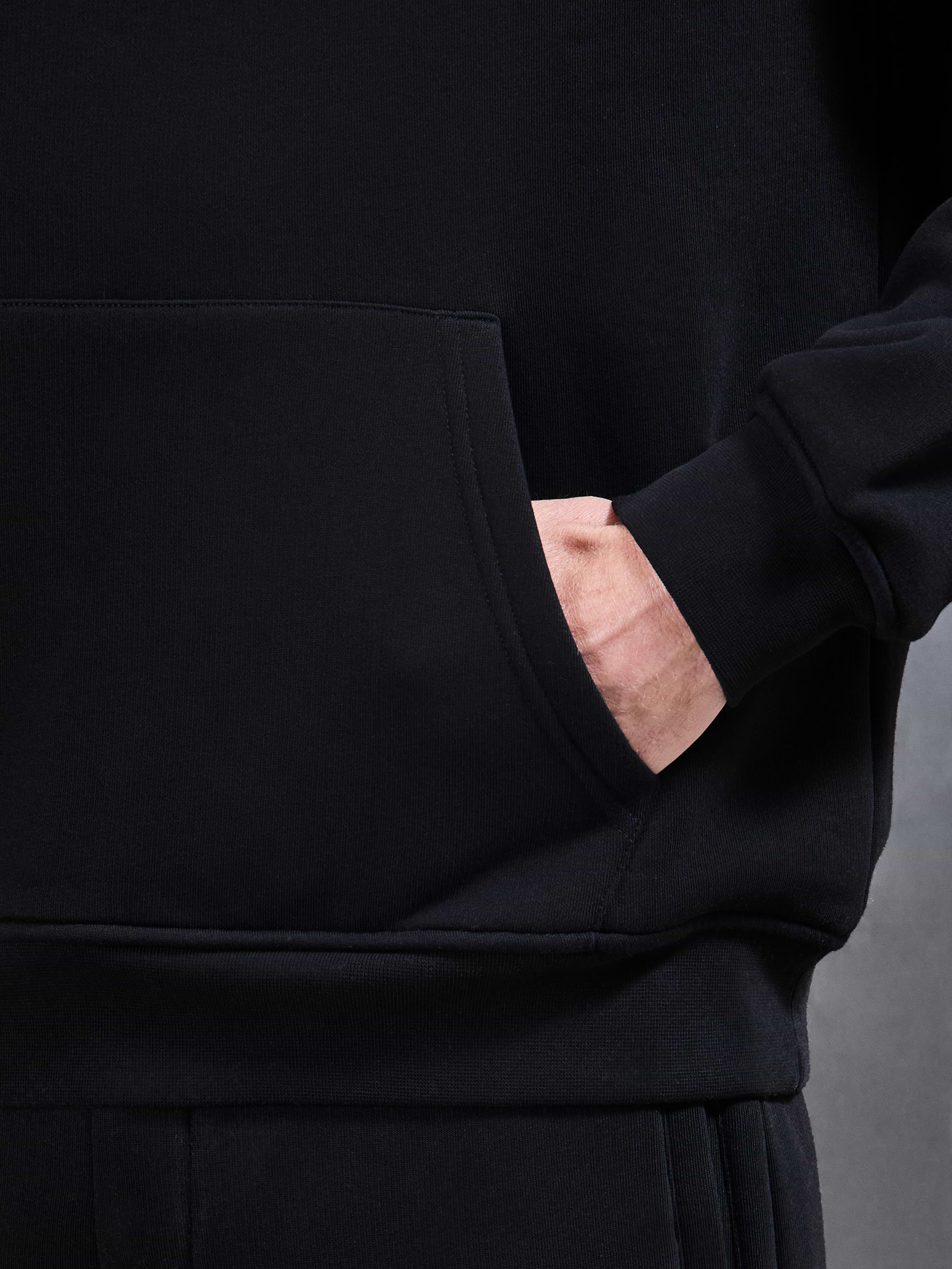 Essential Relaxed Hoodie in Black