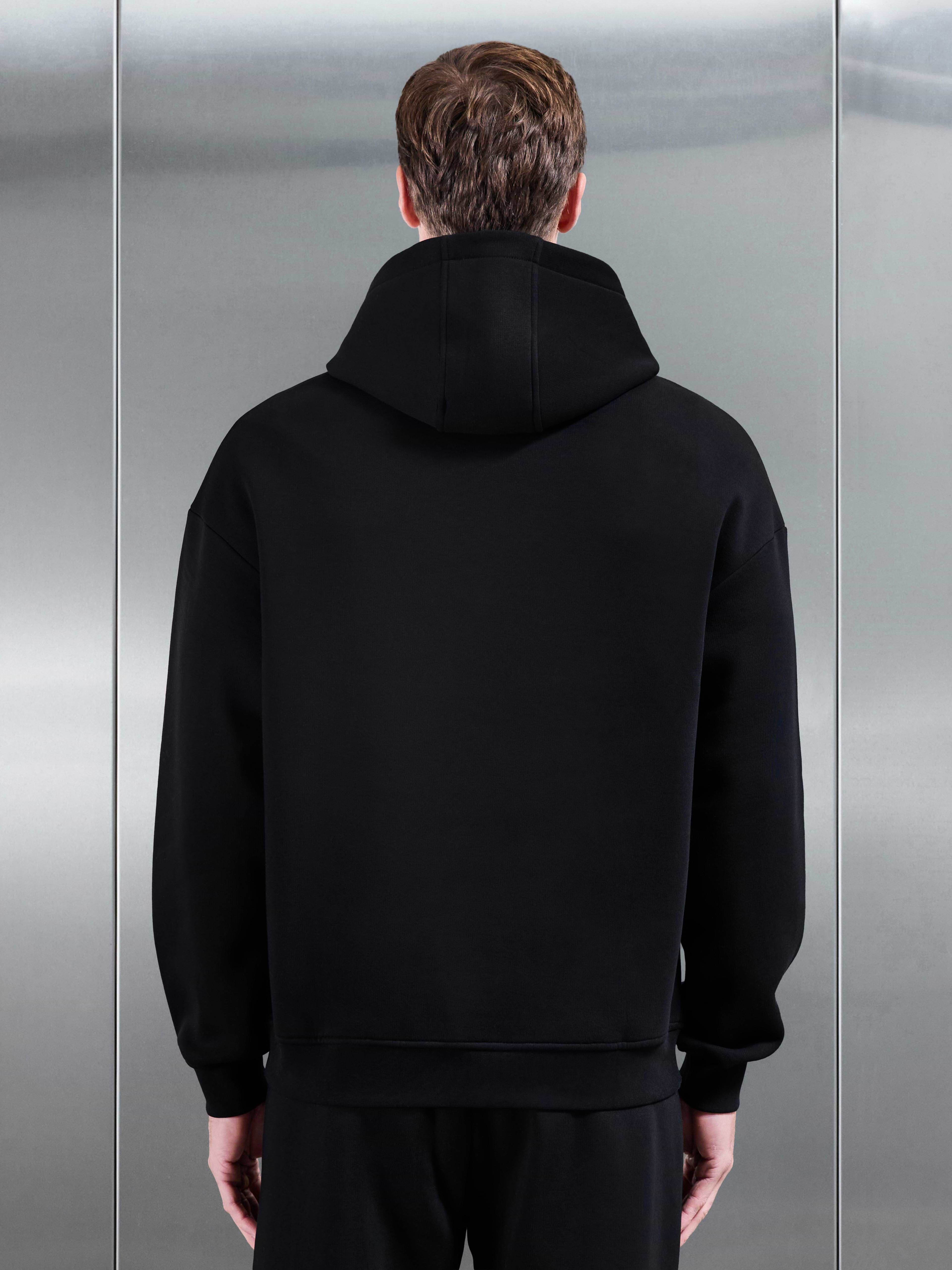 Essential Relaxed Hoodie in Black