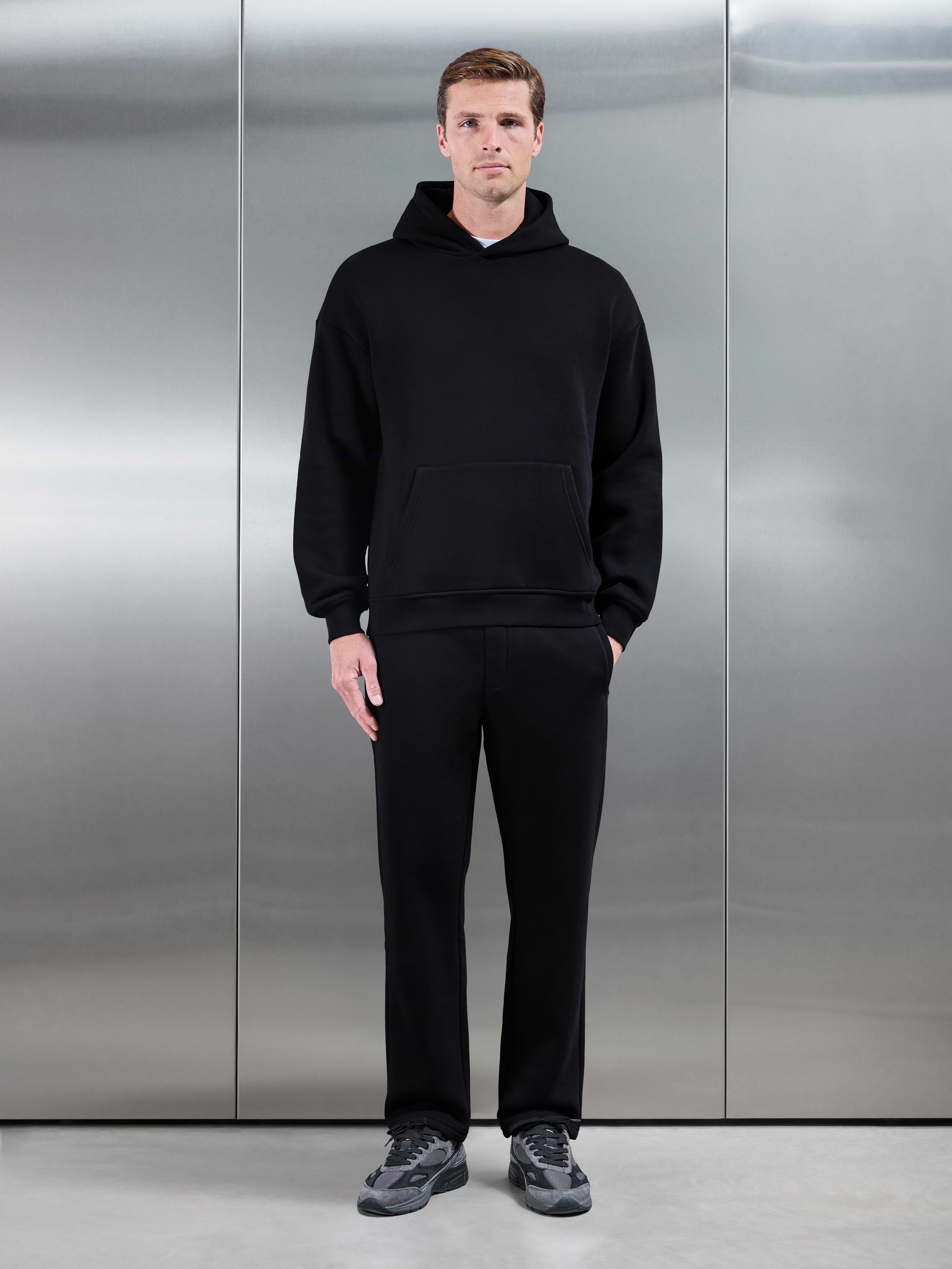 Essential Relaxed Hoodie in Black