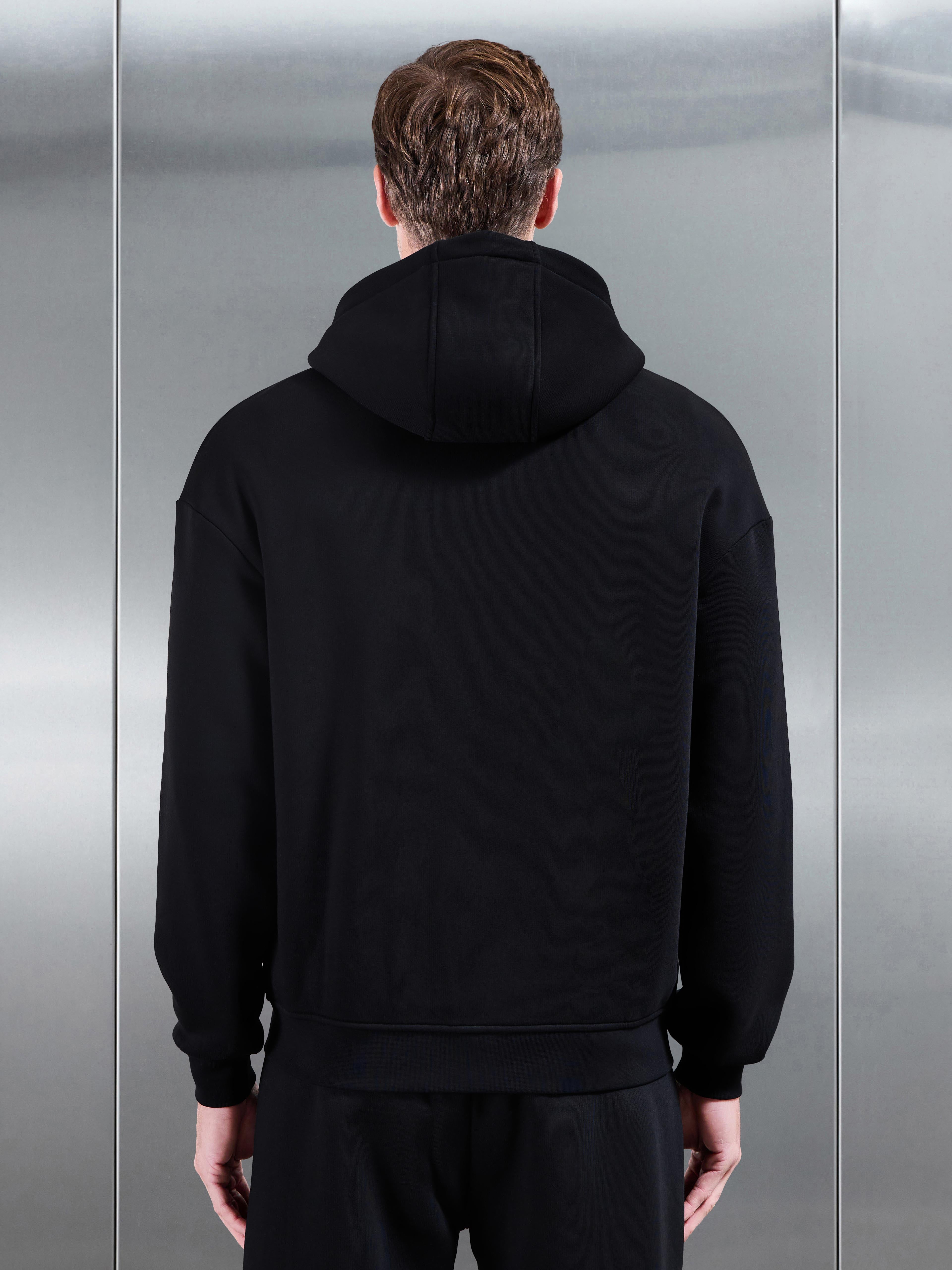 Essential Relaxed Zip Hoodie in Black