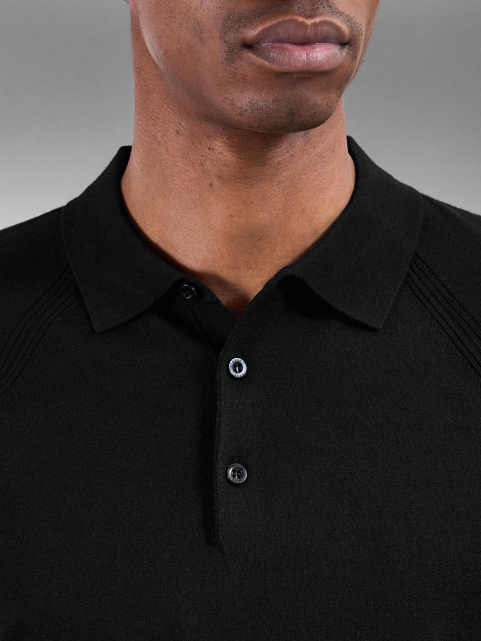 Golf Knitted Button Polo Shirt in Black