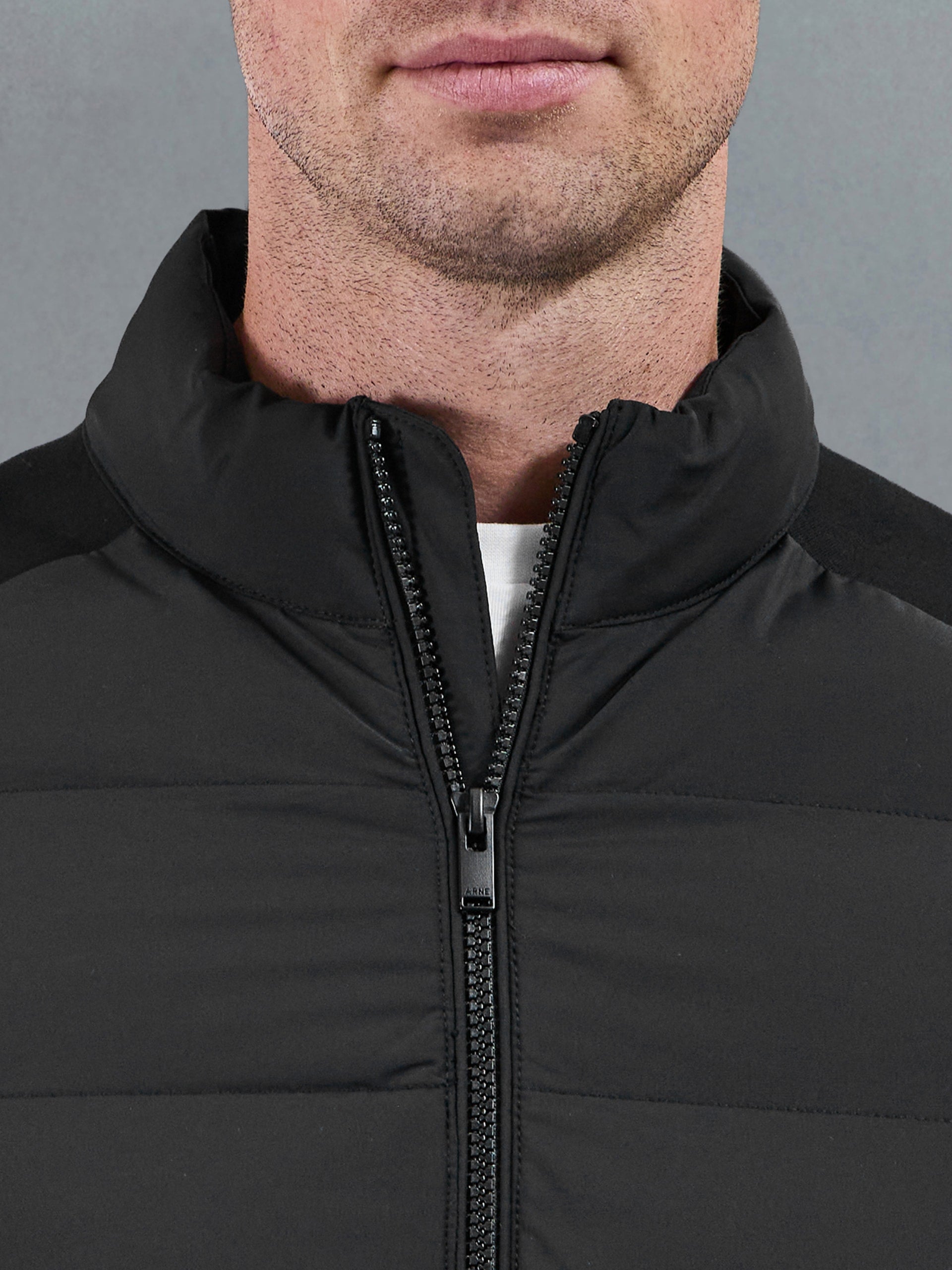 Hybrid Technical Puffer Jacket in Black