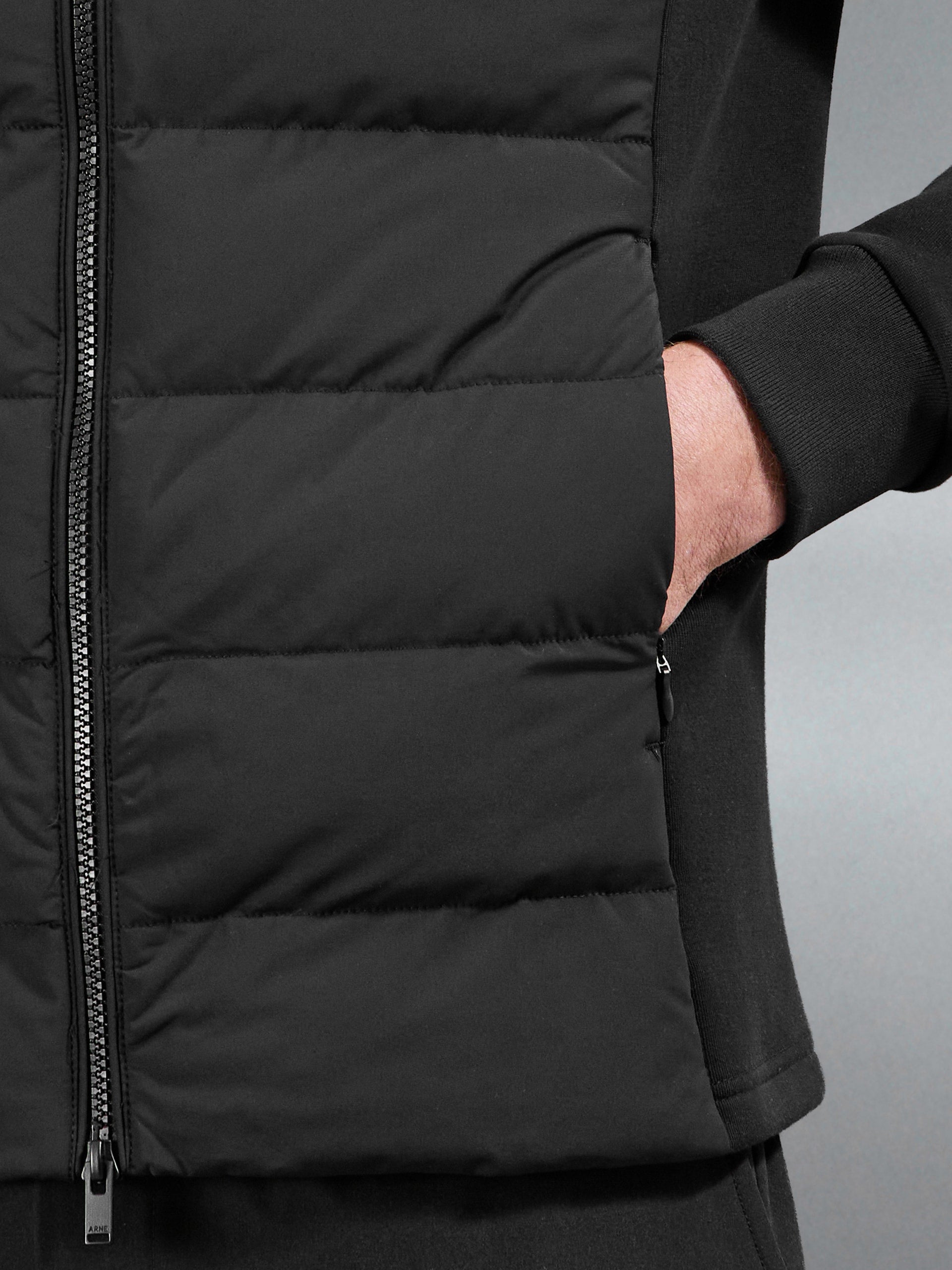 Hybrid Technical Puffer Jacket in Black