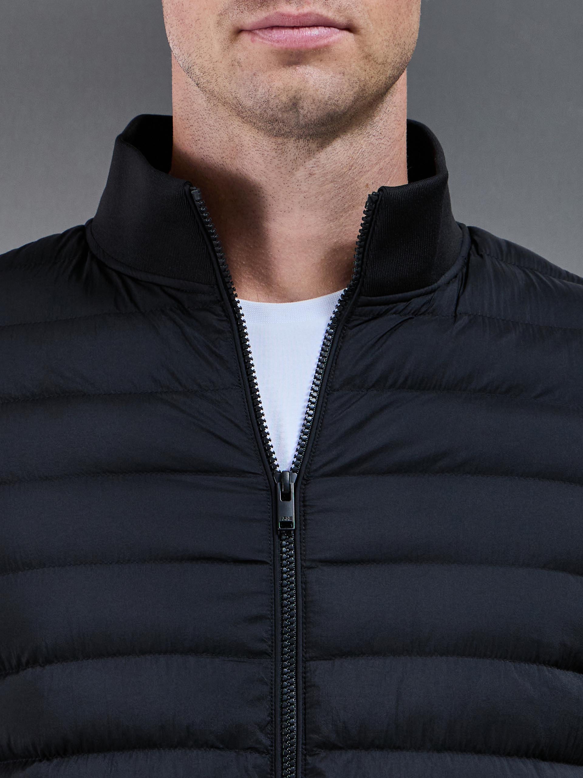 Hybrid Quilted Technical Funnel Neck Jacket in Black