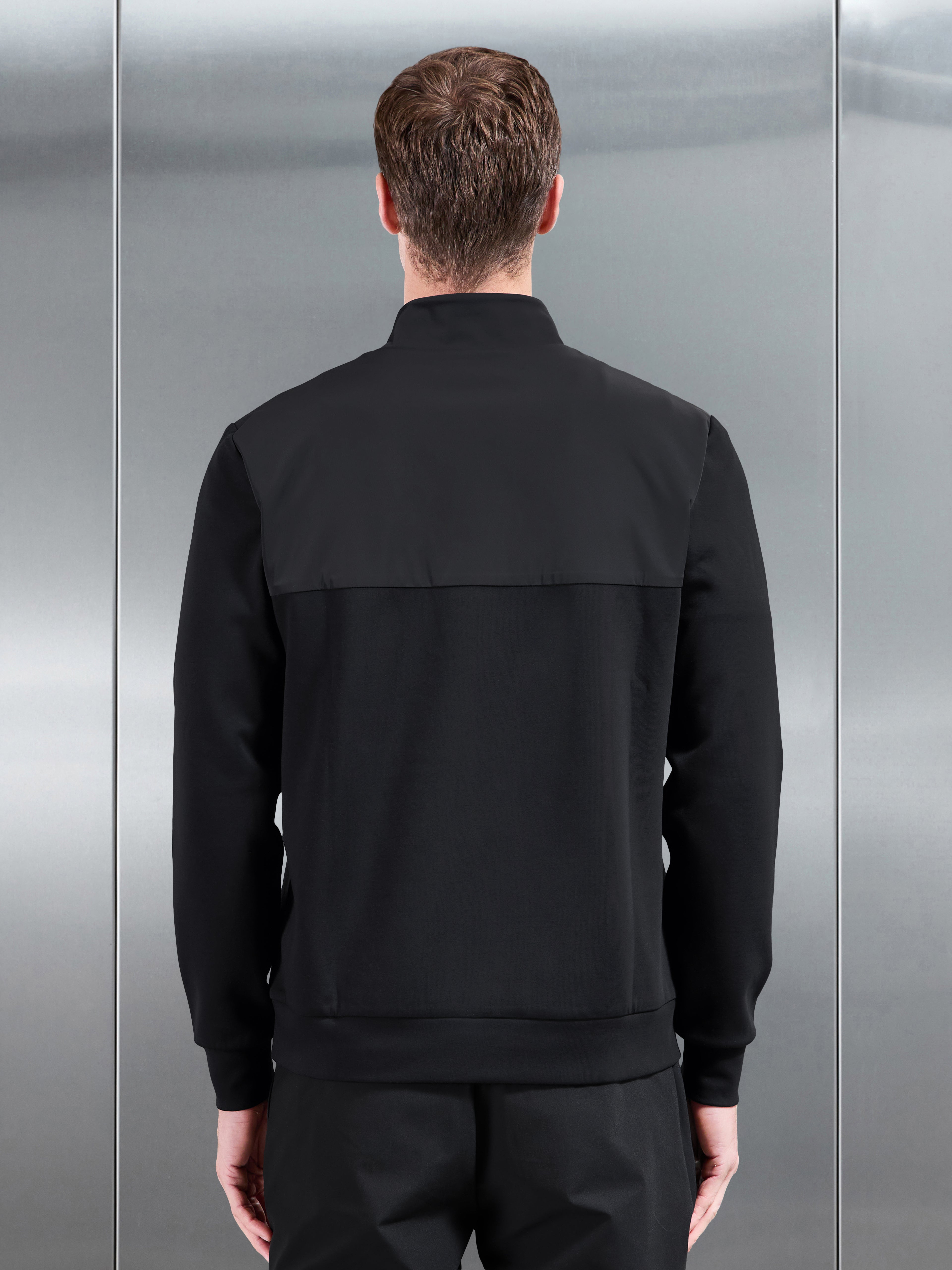 Interlock Jersey Hybrid Half Zip Jumper in Black