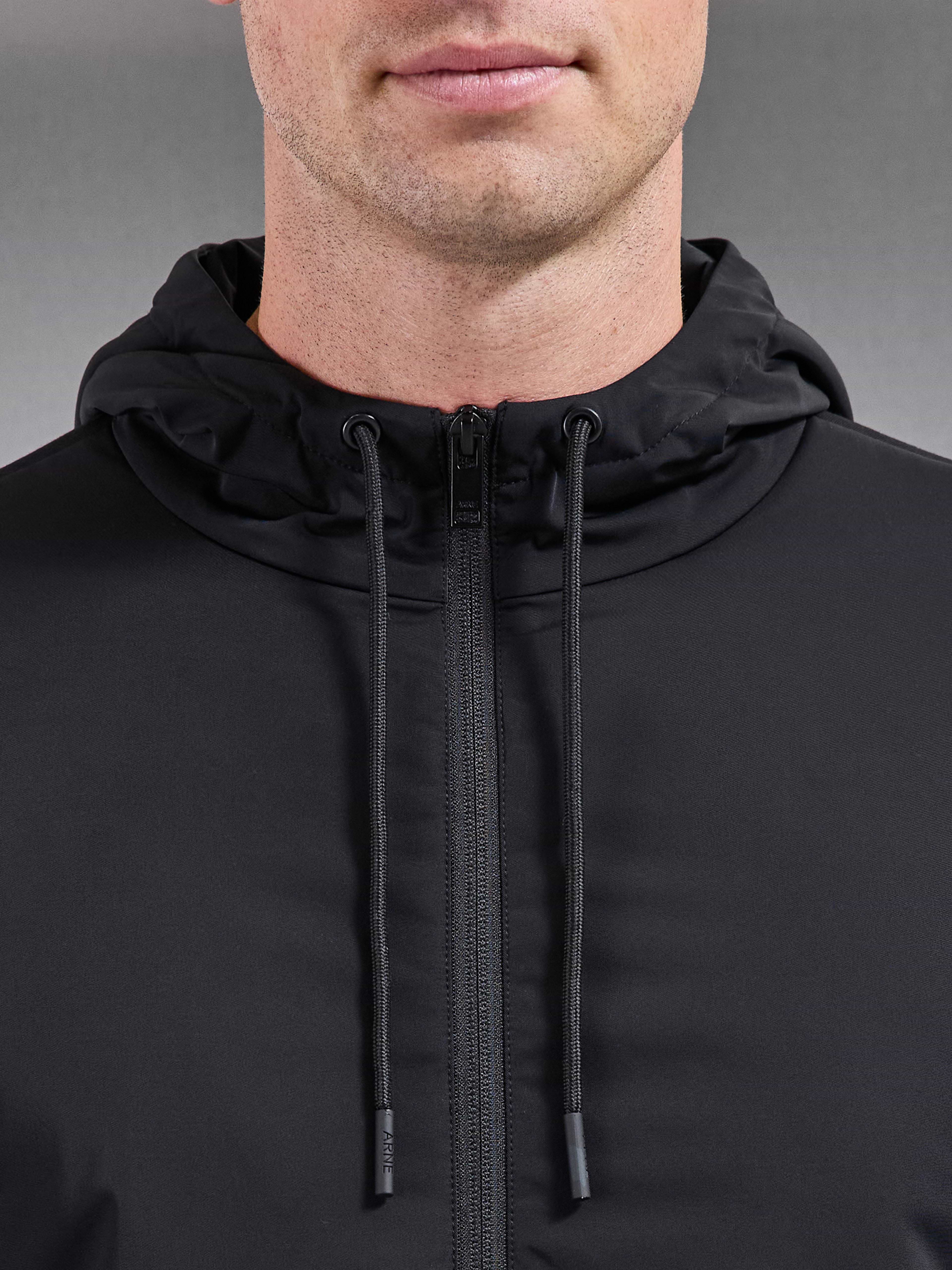 Interlock Jersey Hybrid Technical Windbreaker in Black