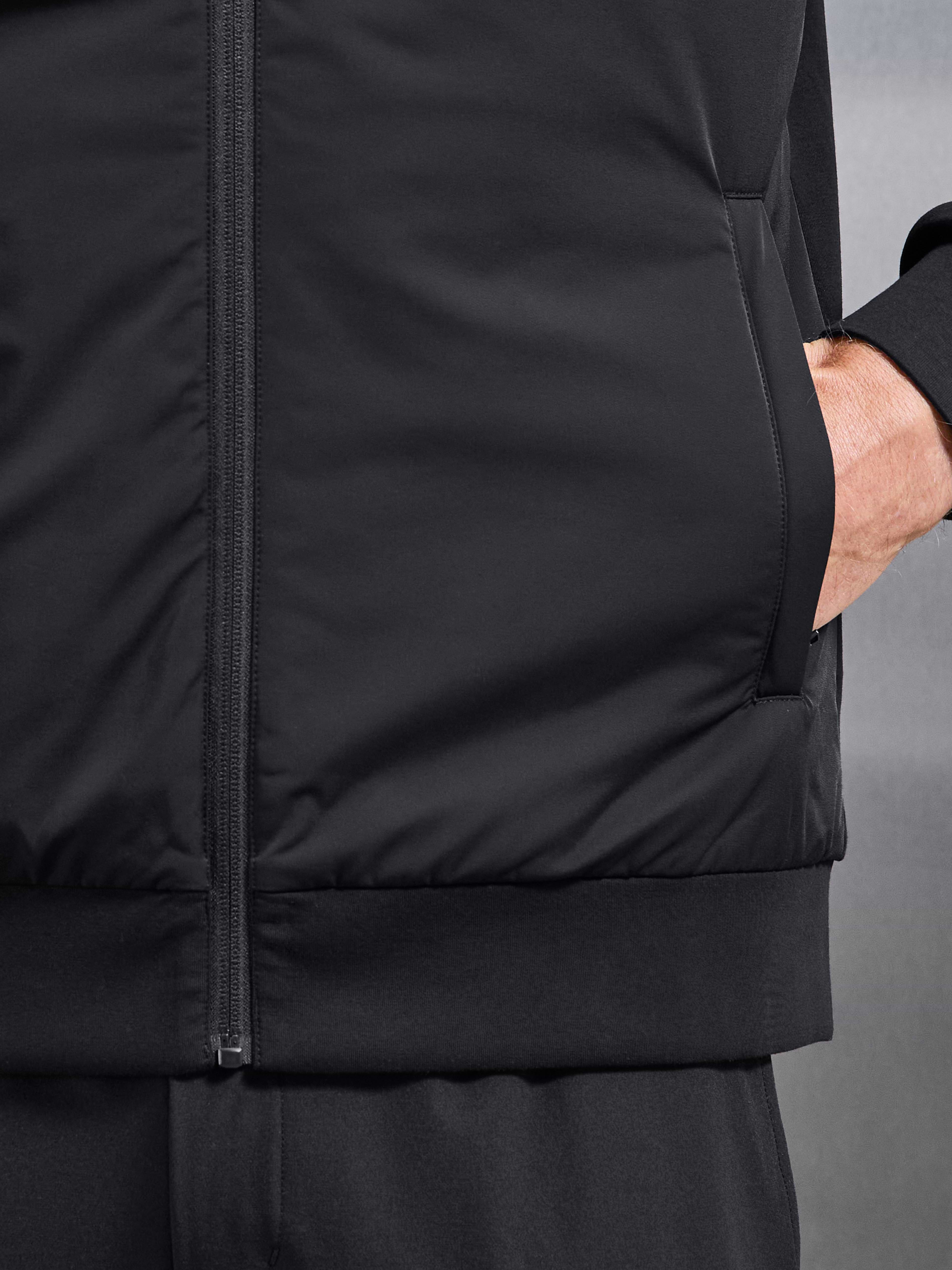 Interlock Jersey Hybrid Technical Windbreaker in Black