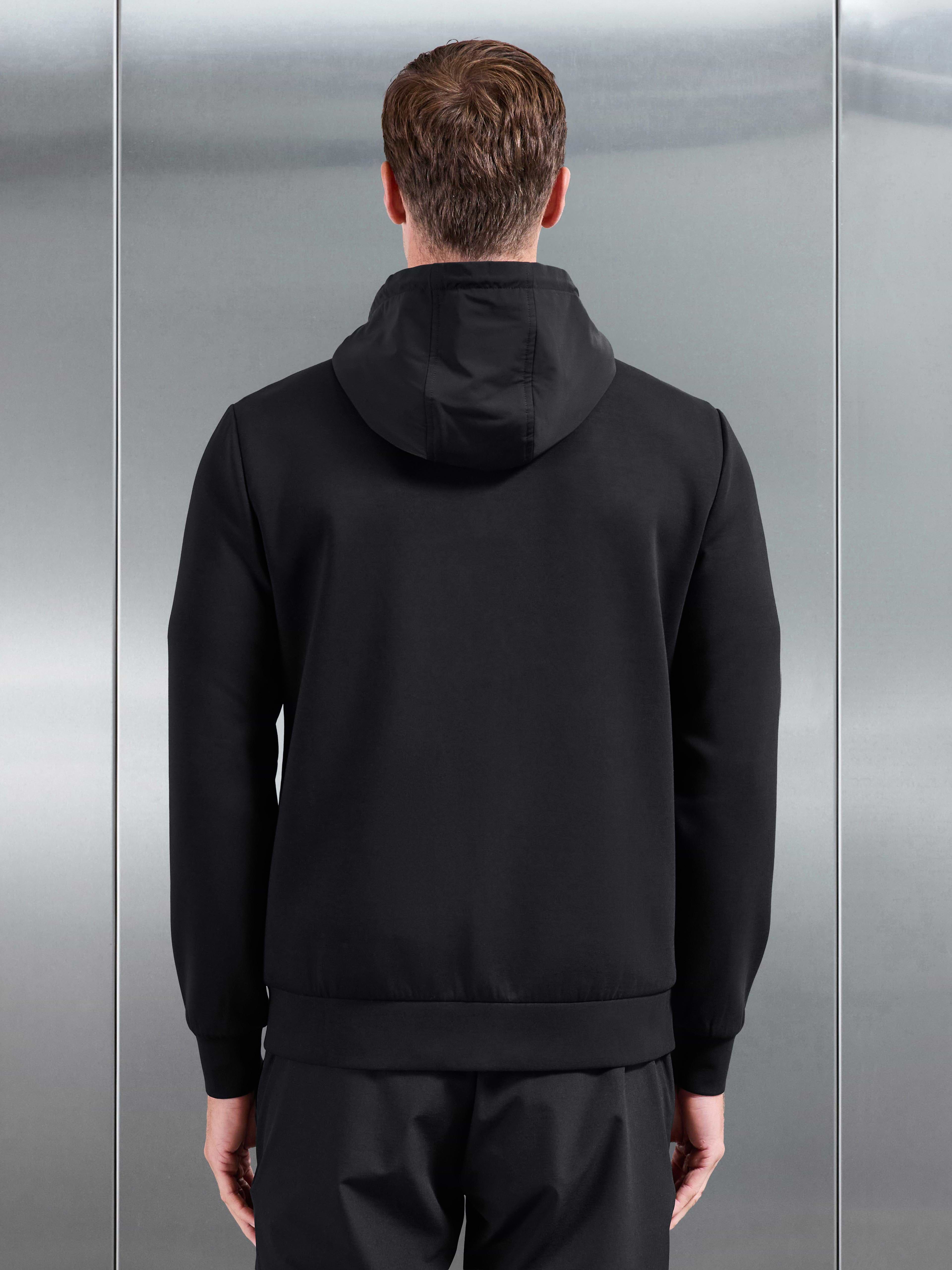 Interlock Jersey Hybrid Technical Windbreaker in Black