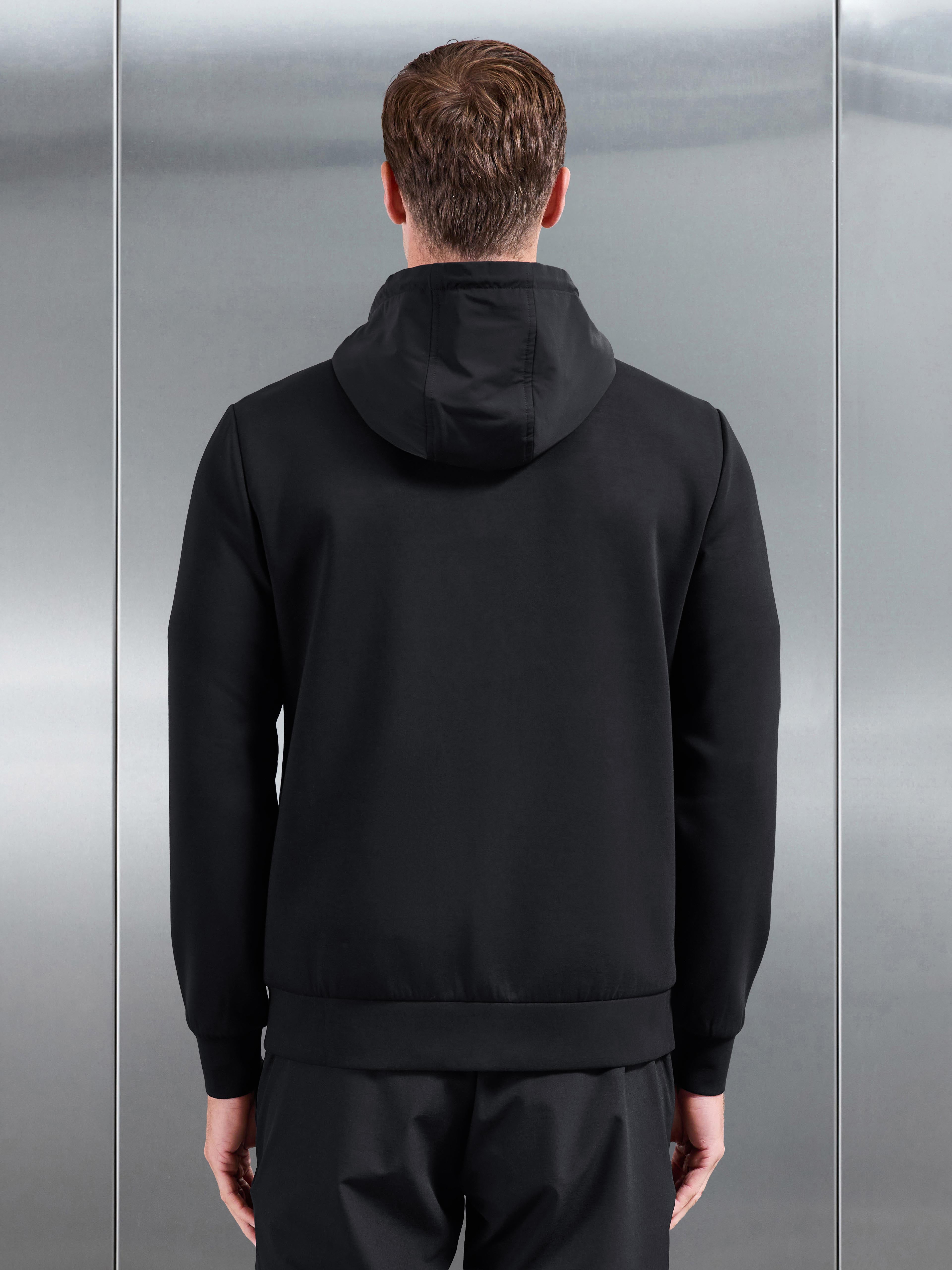 Interlock Jersey Hybrid Technical Windbreaker in Black