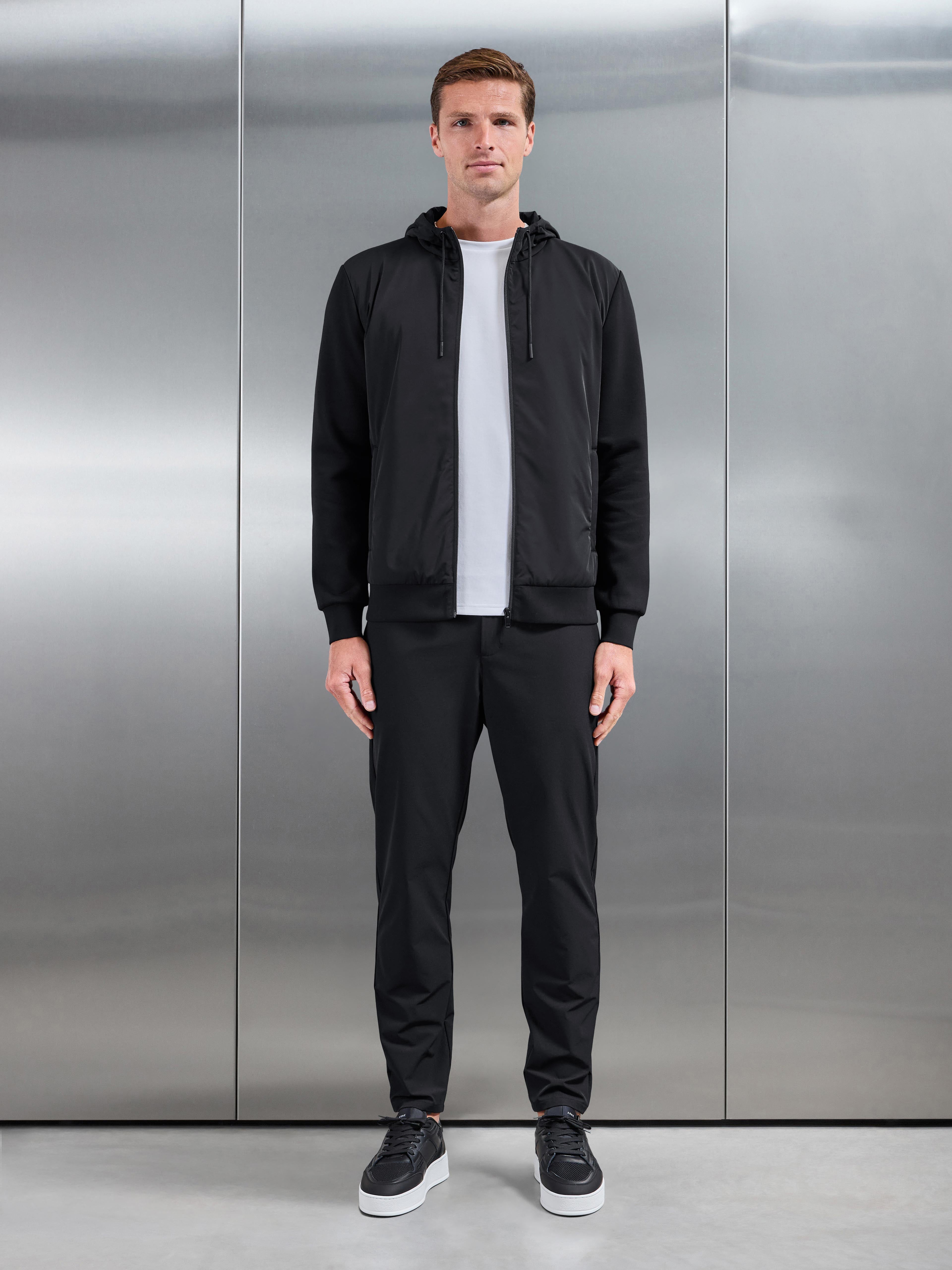 Interlock Jersey Hybrid Technical Windbreaker in Black