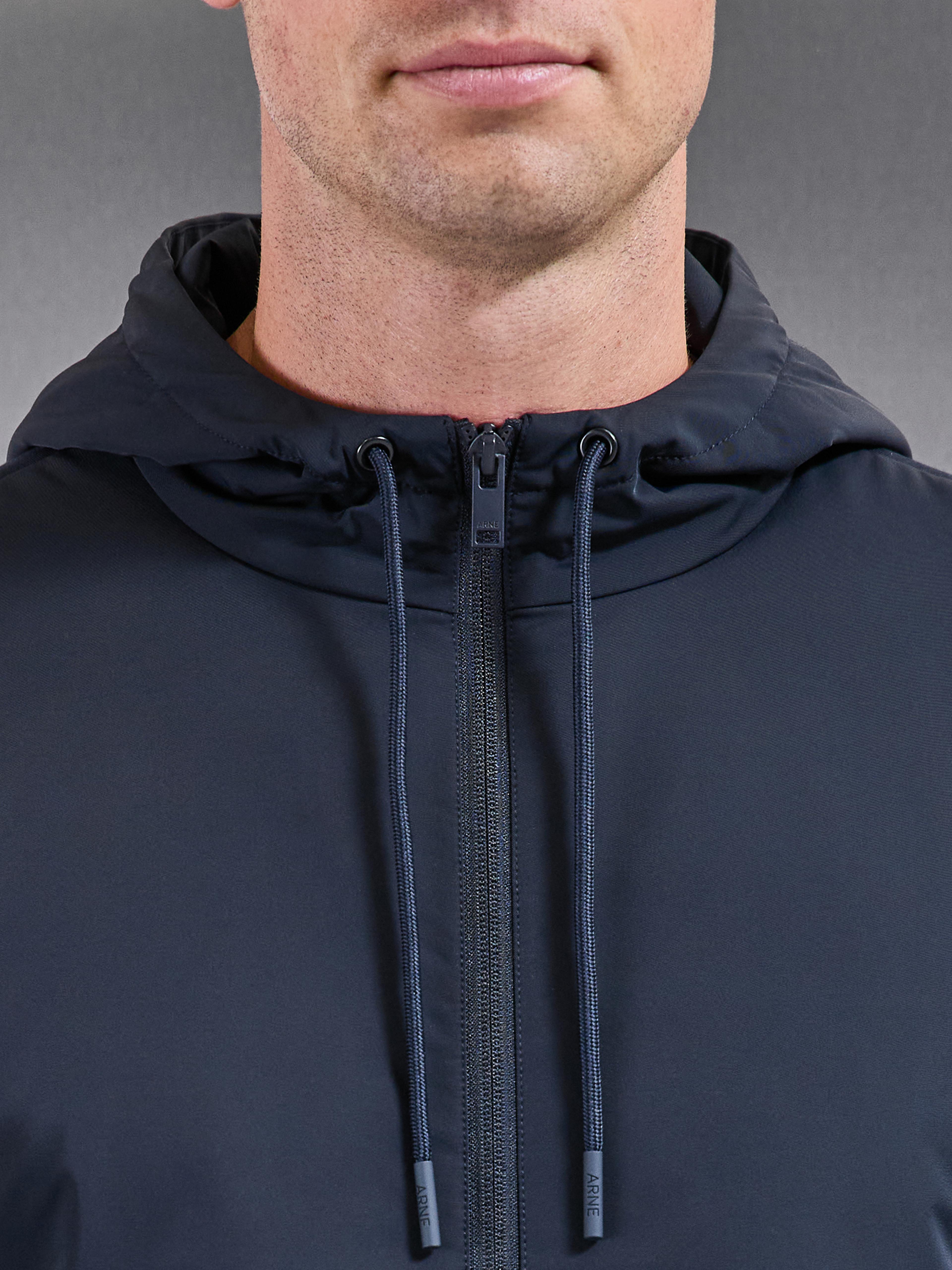 Interlock Jersey Hybrid Technical Windbreaker in Navy