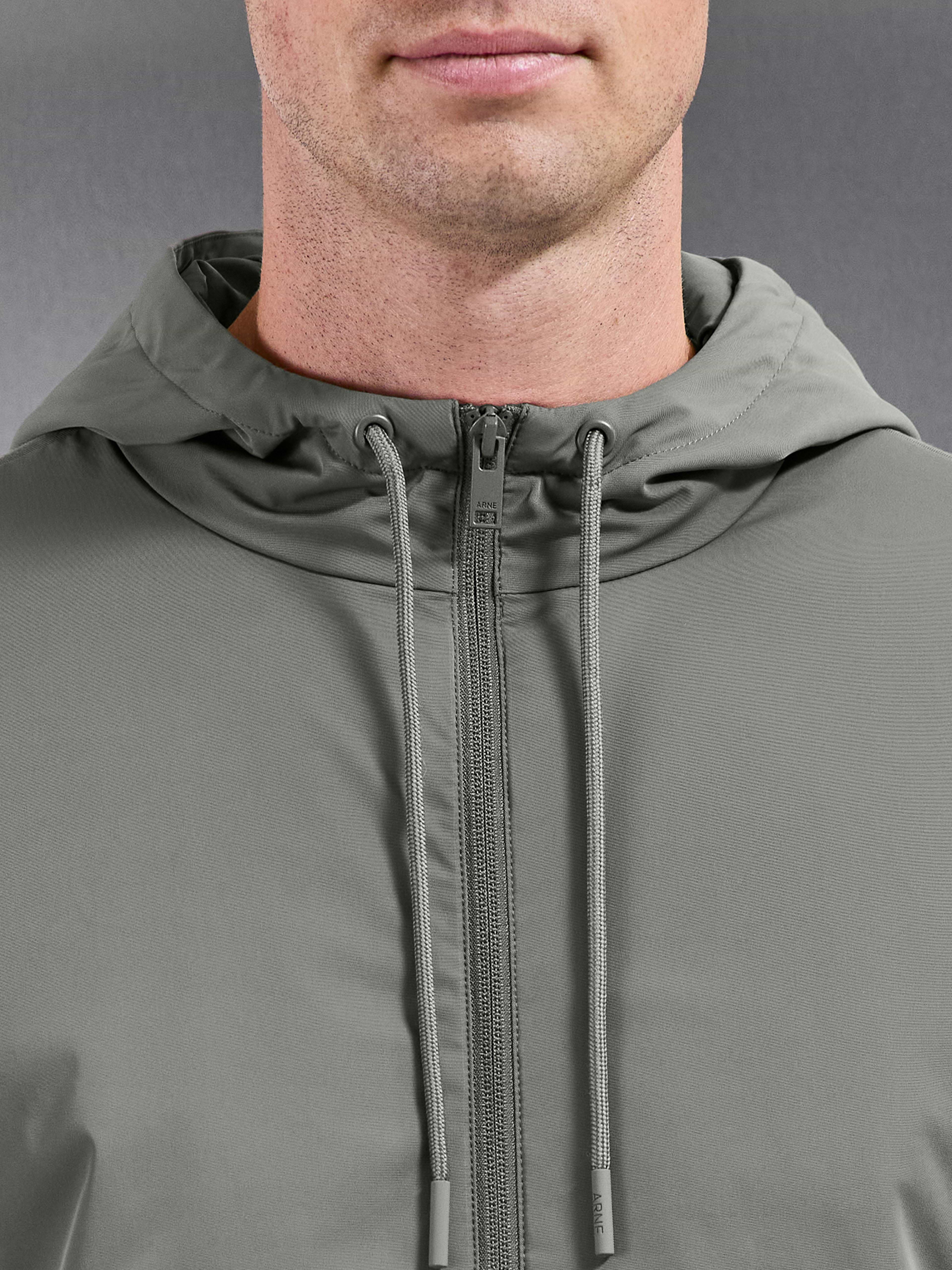 Interlock Jersey Hybrid Technical Windbreaker in Sage