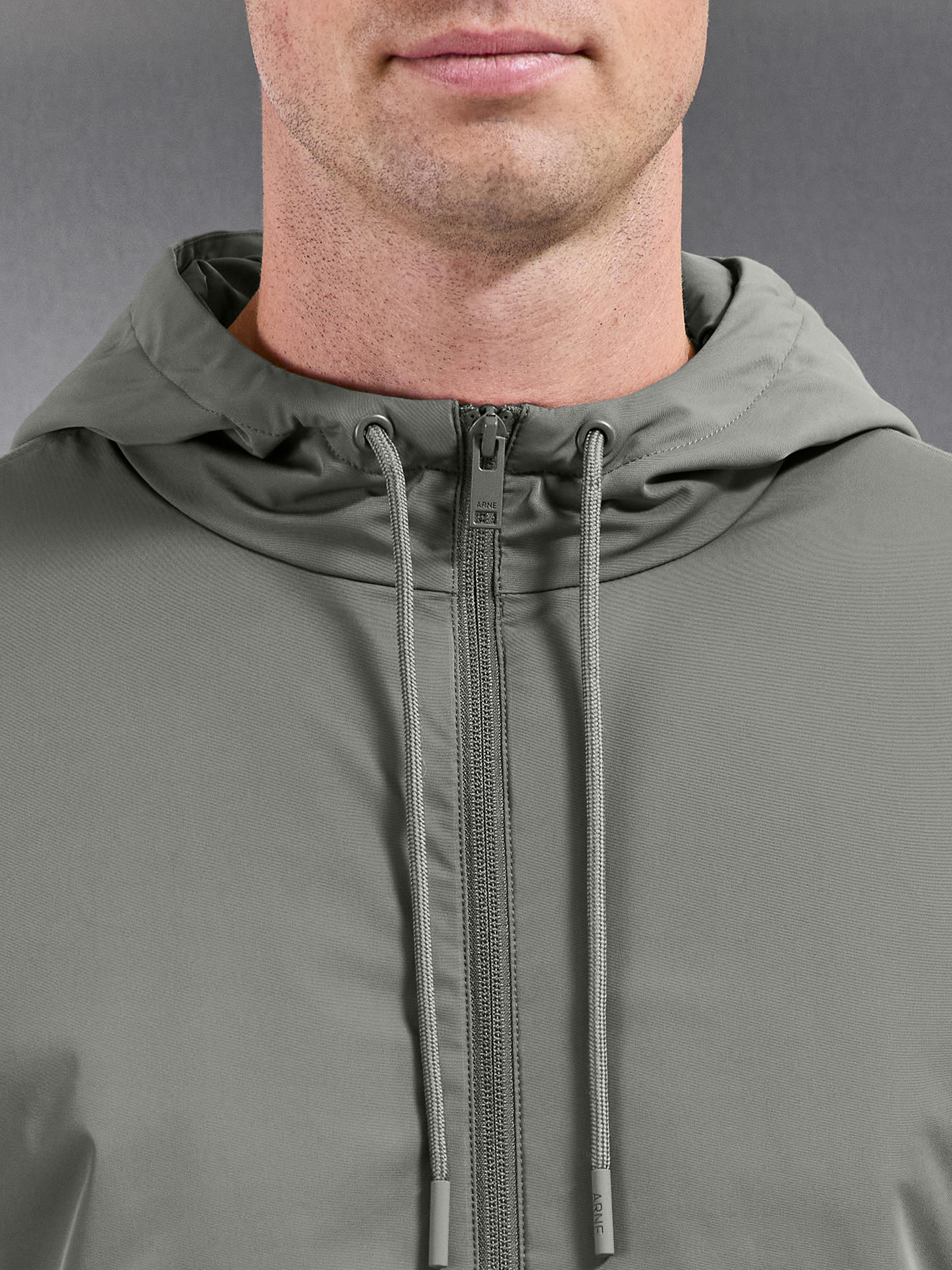 Interlock Jersey Hybrid Technical Windbreaker in Sage