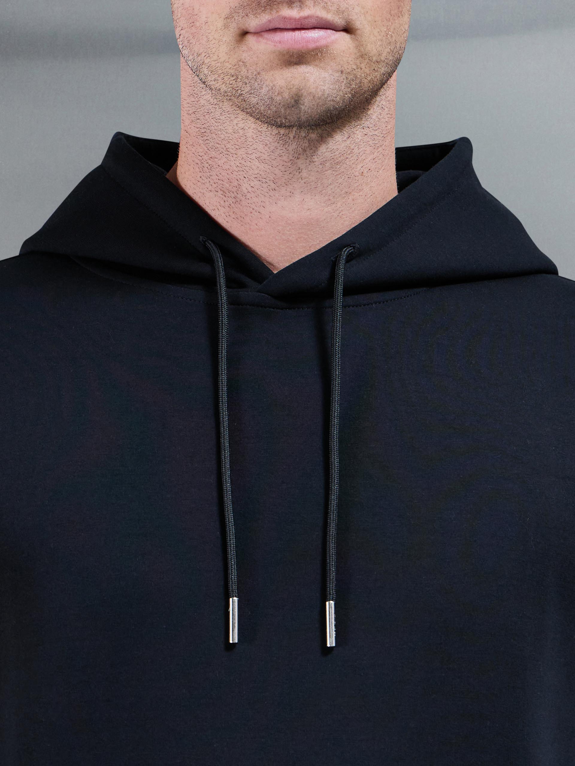 Interlock Jersey Hoodie in Black