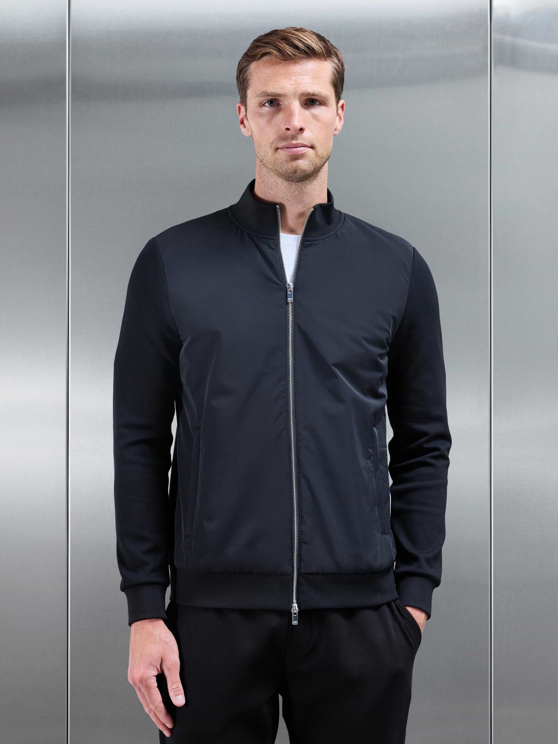 Interlock Jersey Hybrid Funnel Neck Jacket in Black