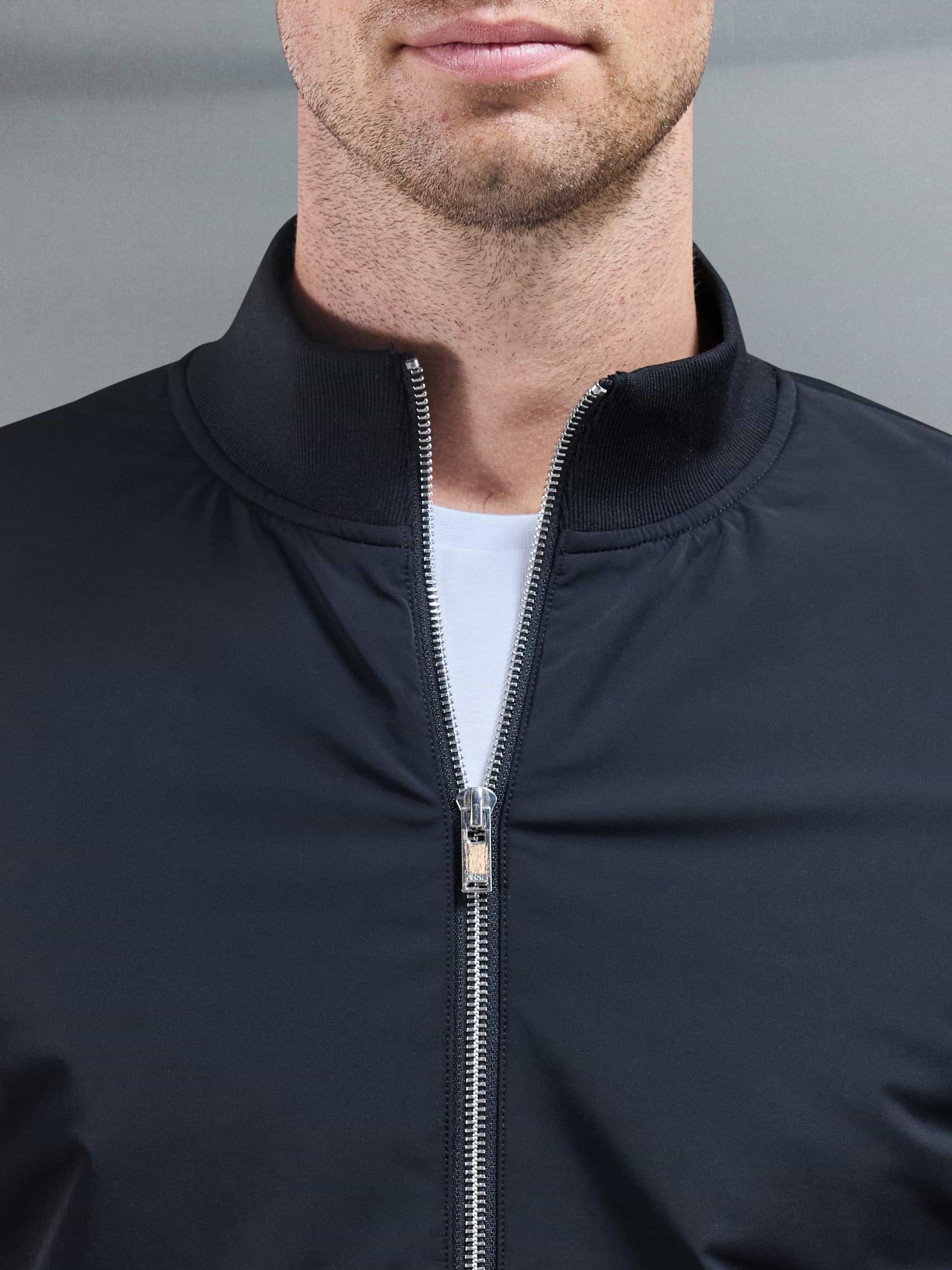 Interlock Jersey Hybrid Funnel Neck Jacket in Black