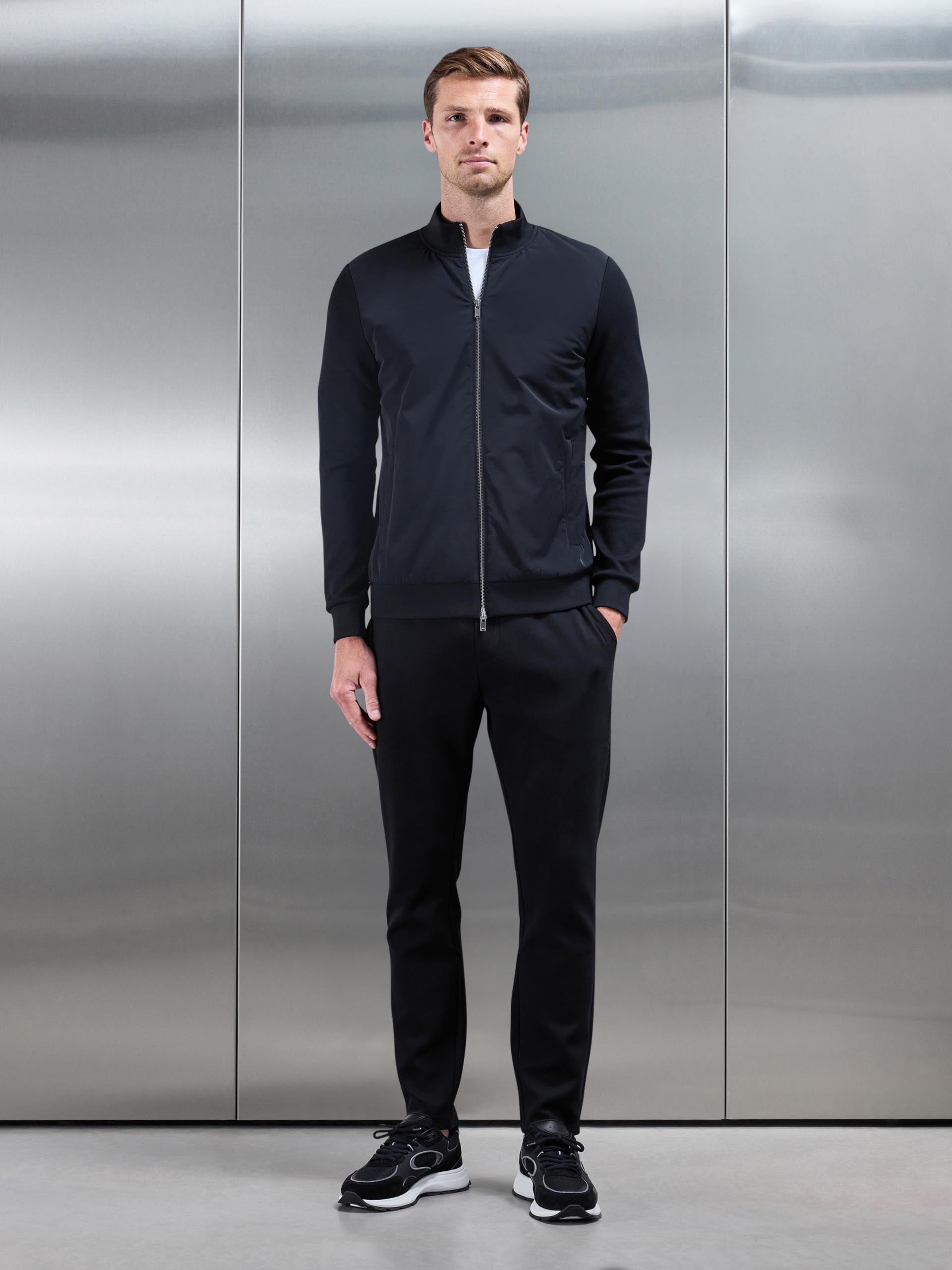 Interlock Jersey Hybrid Funnel Neck Jacket in Black