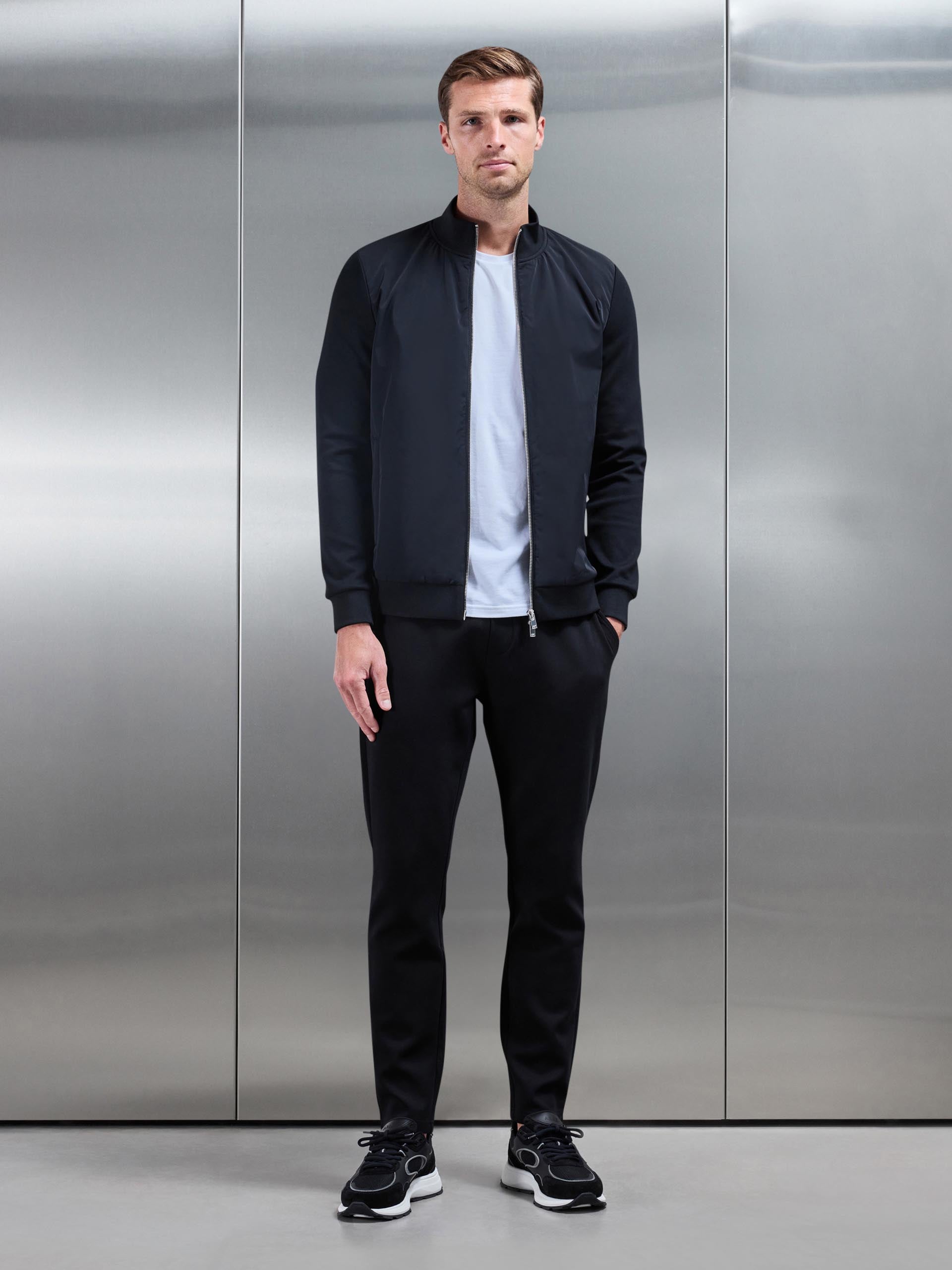 Interlock Jersey Hybrid Funnel Neck Jacket in Black