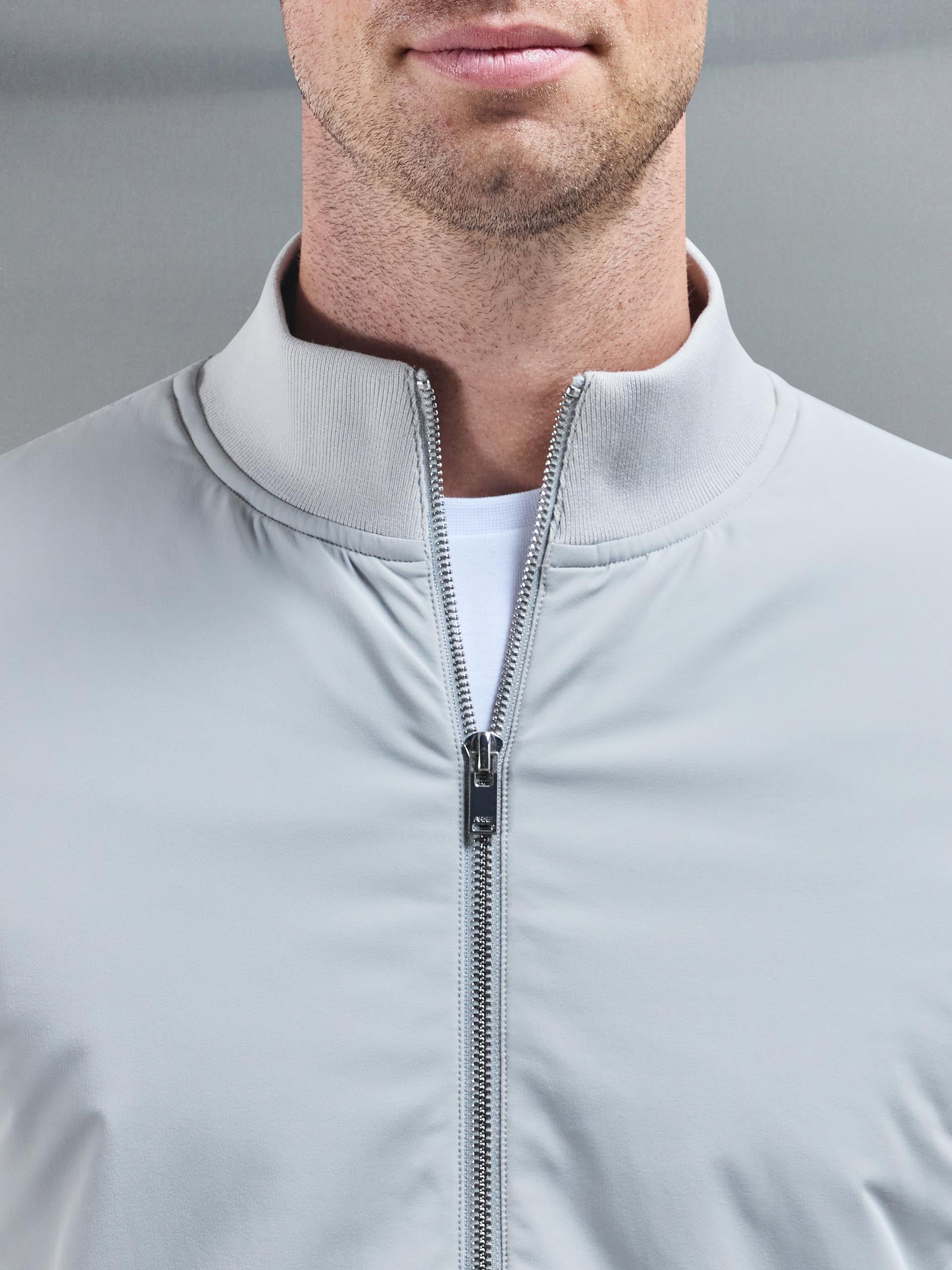 Interlock Jersey Hybrid Funnel Neck Jacket in Marl Grey