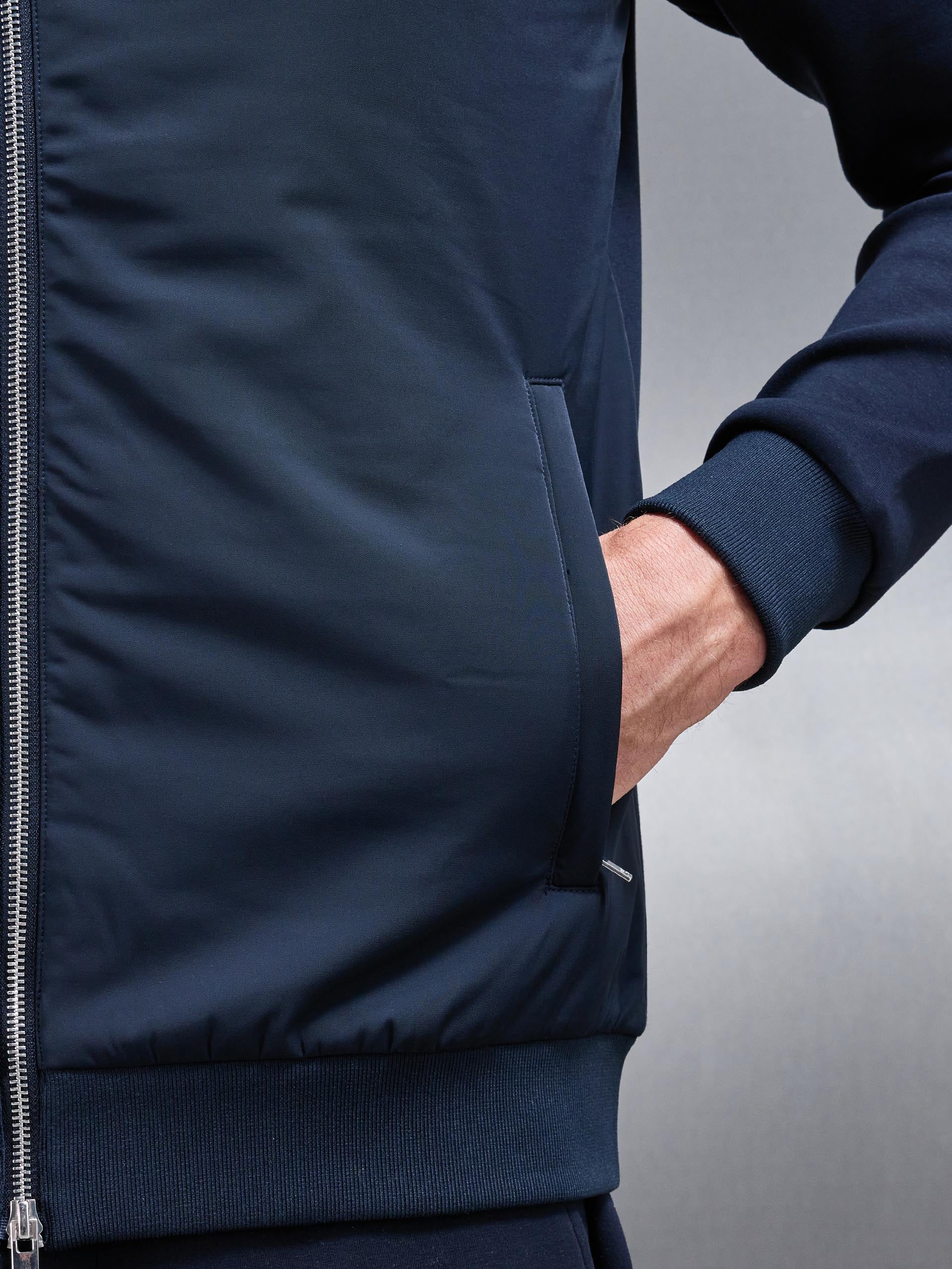 Interlock Jersey Hybrid Funnel Neck Jacket in Navy