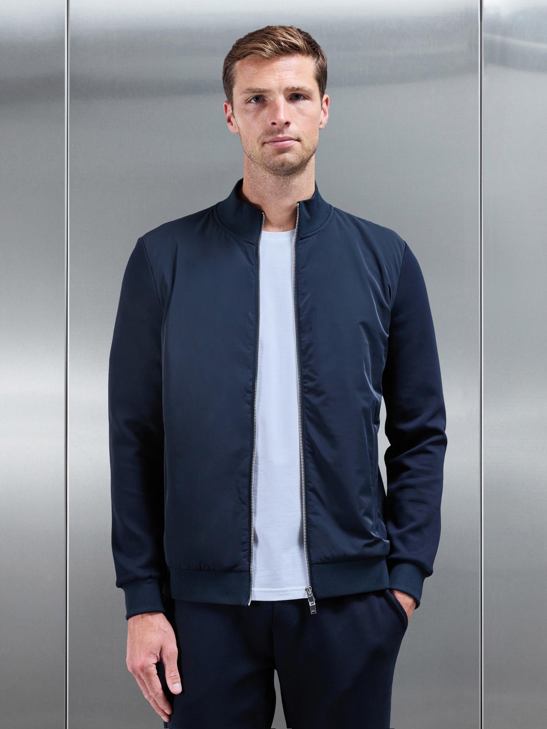 Interlock Jersey Hybrid Funnel Neck Jacket in Navy