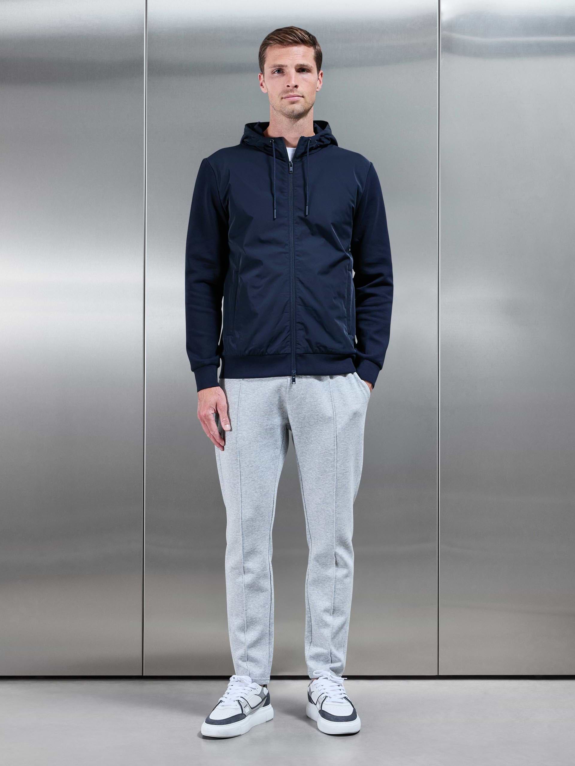 Interlock Jersey Hybrid Technical Windbreaker in Navy