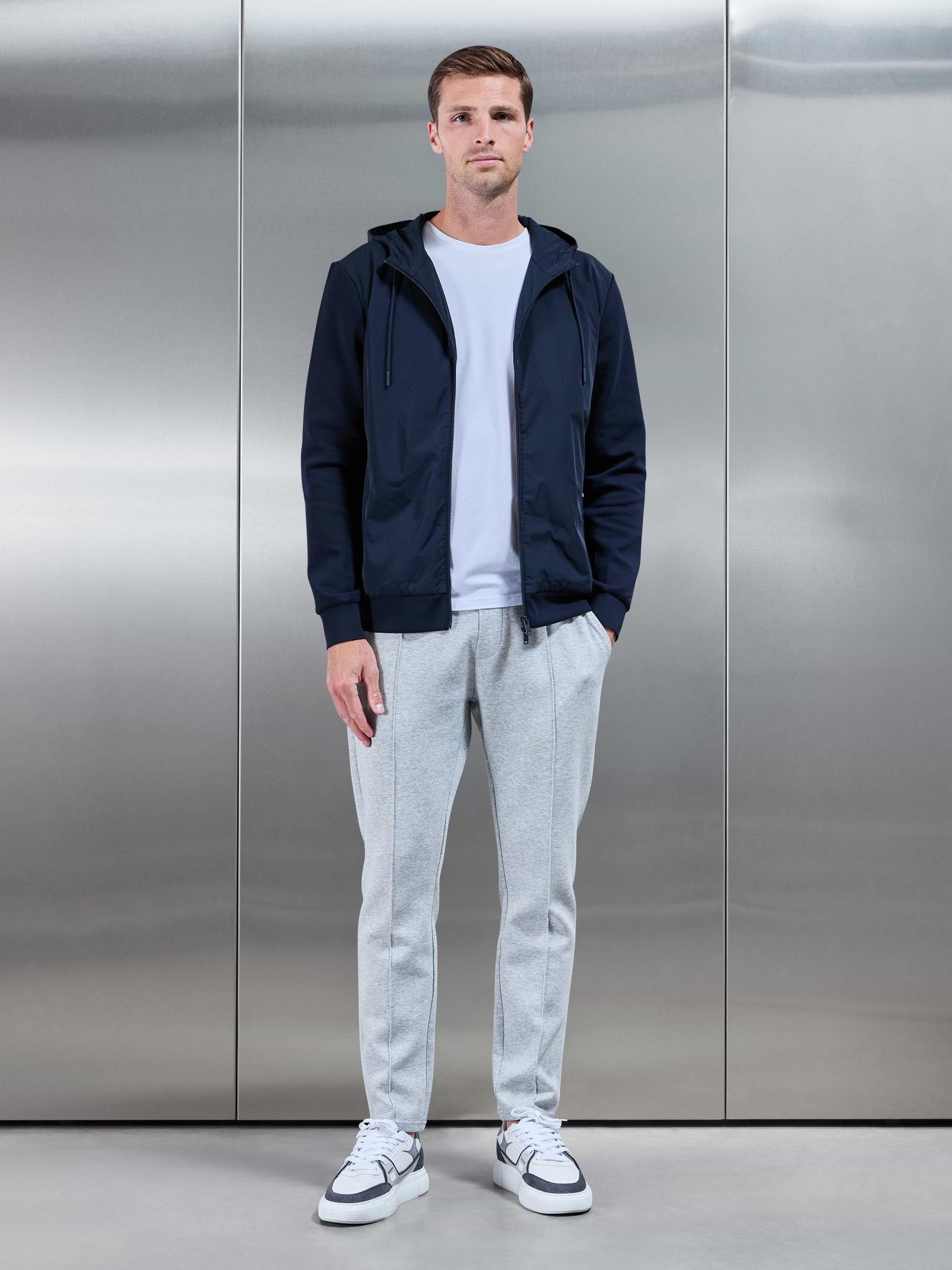 Interlock Jersey Hybrid Technical Windbreaker in Navy