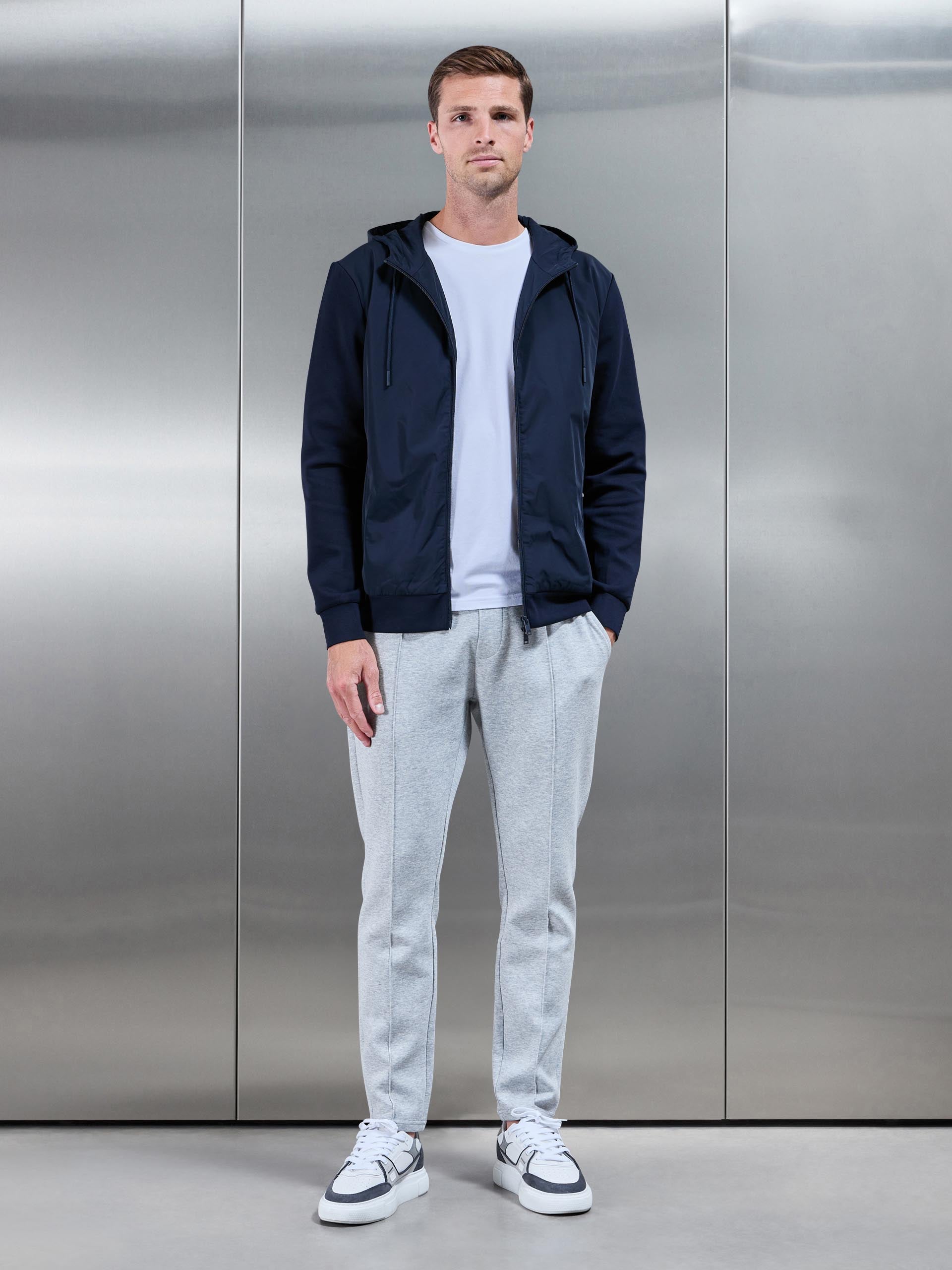 Interlock Jersey Hybrid Technical Windbreaker in Navy