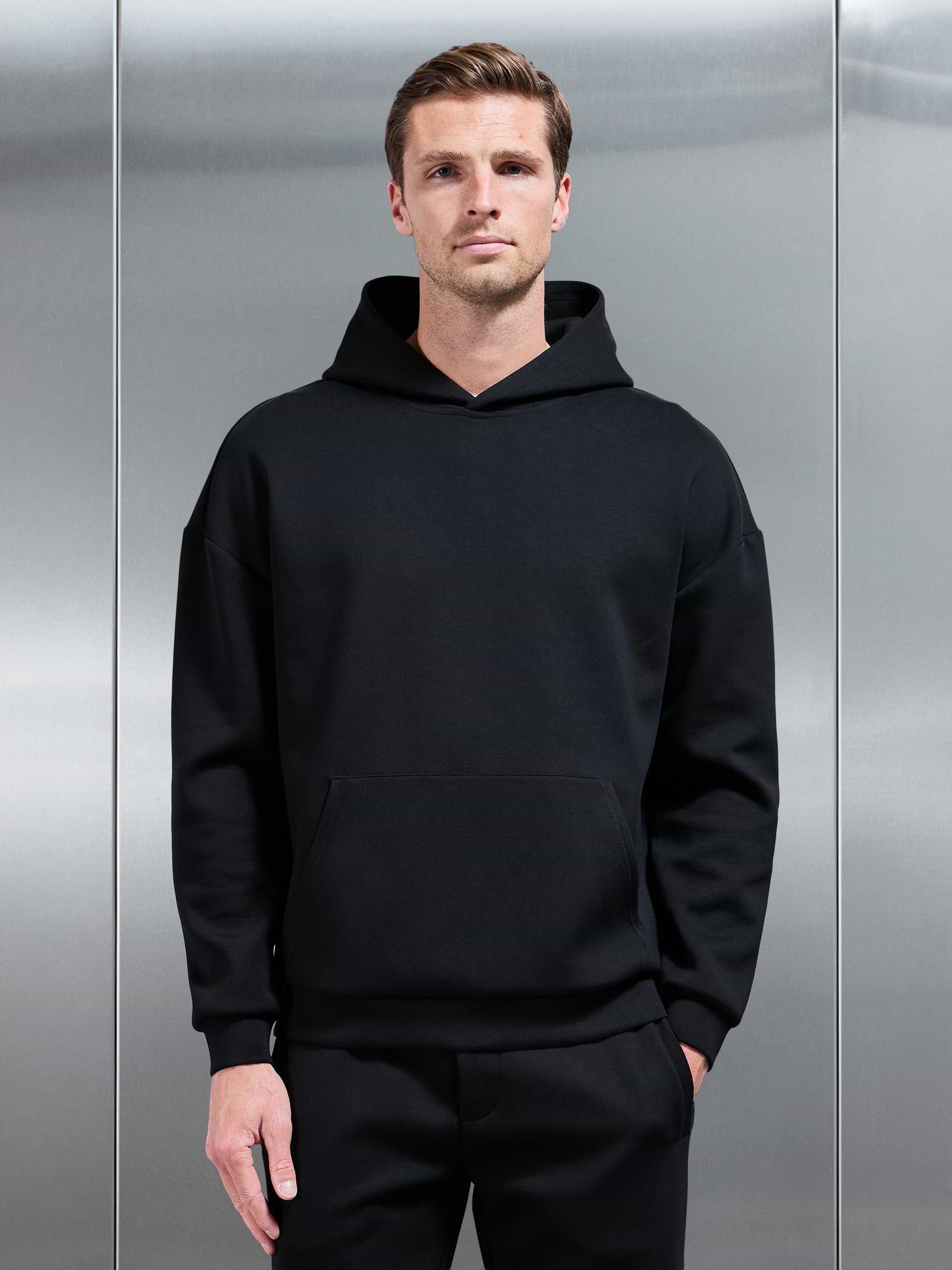 Interlock Jersey Relaxed Fit Hoodie in Black