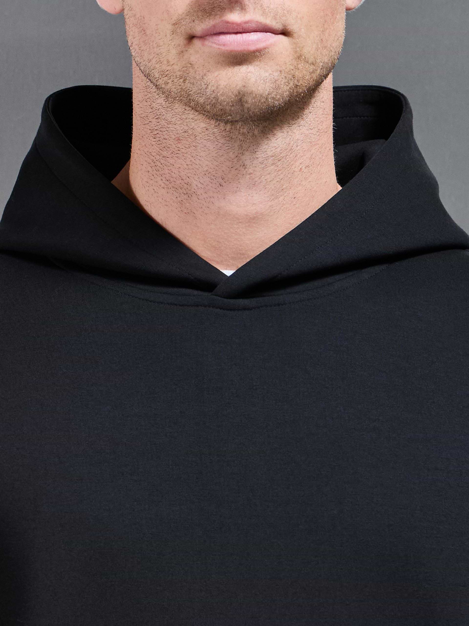 Interlock Jersey Relaxed Fit Hoodie in Black