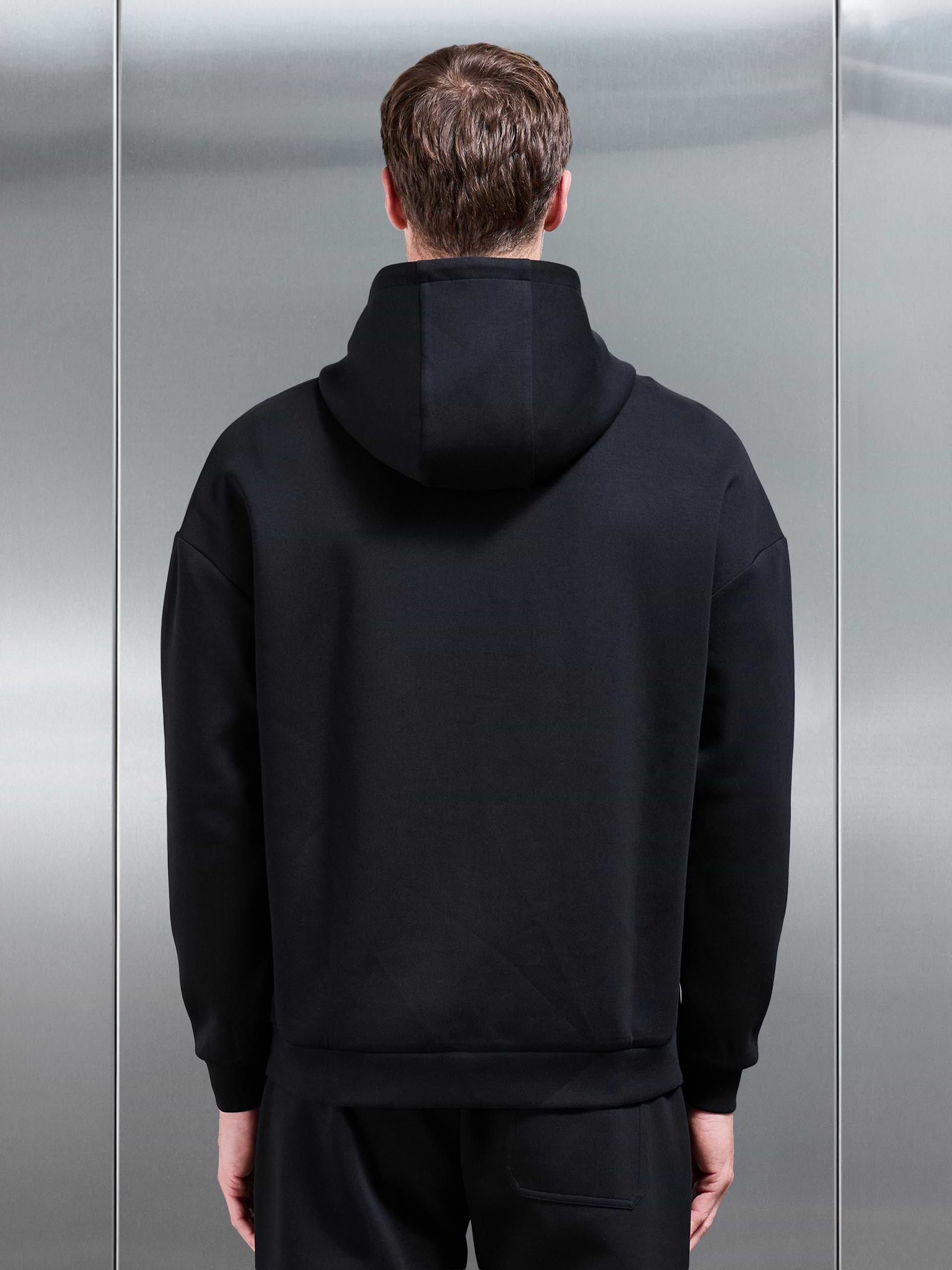 Interlock Jersey Relaxed Fit Hoodie in Black