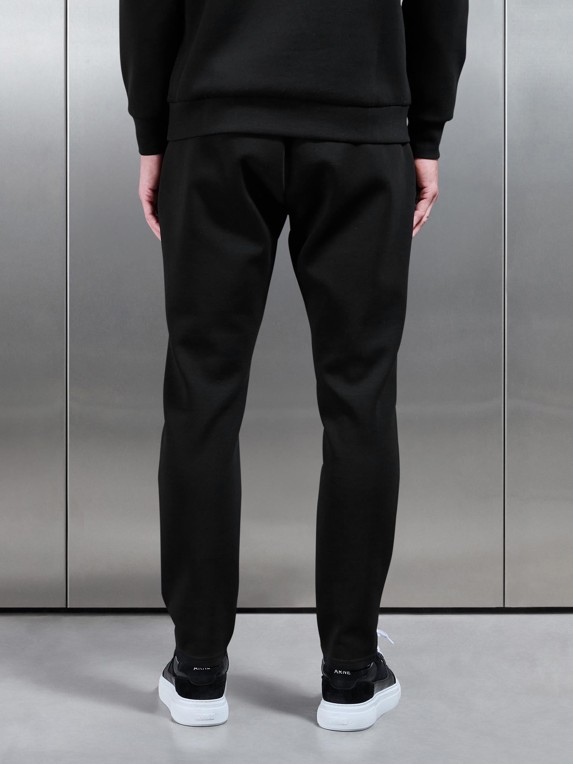 Interlock Jersey Tapered Jogger in Black