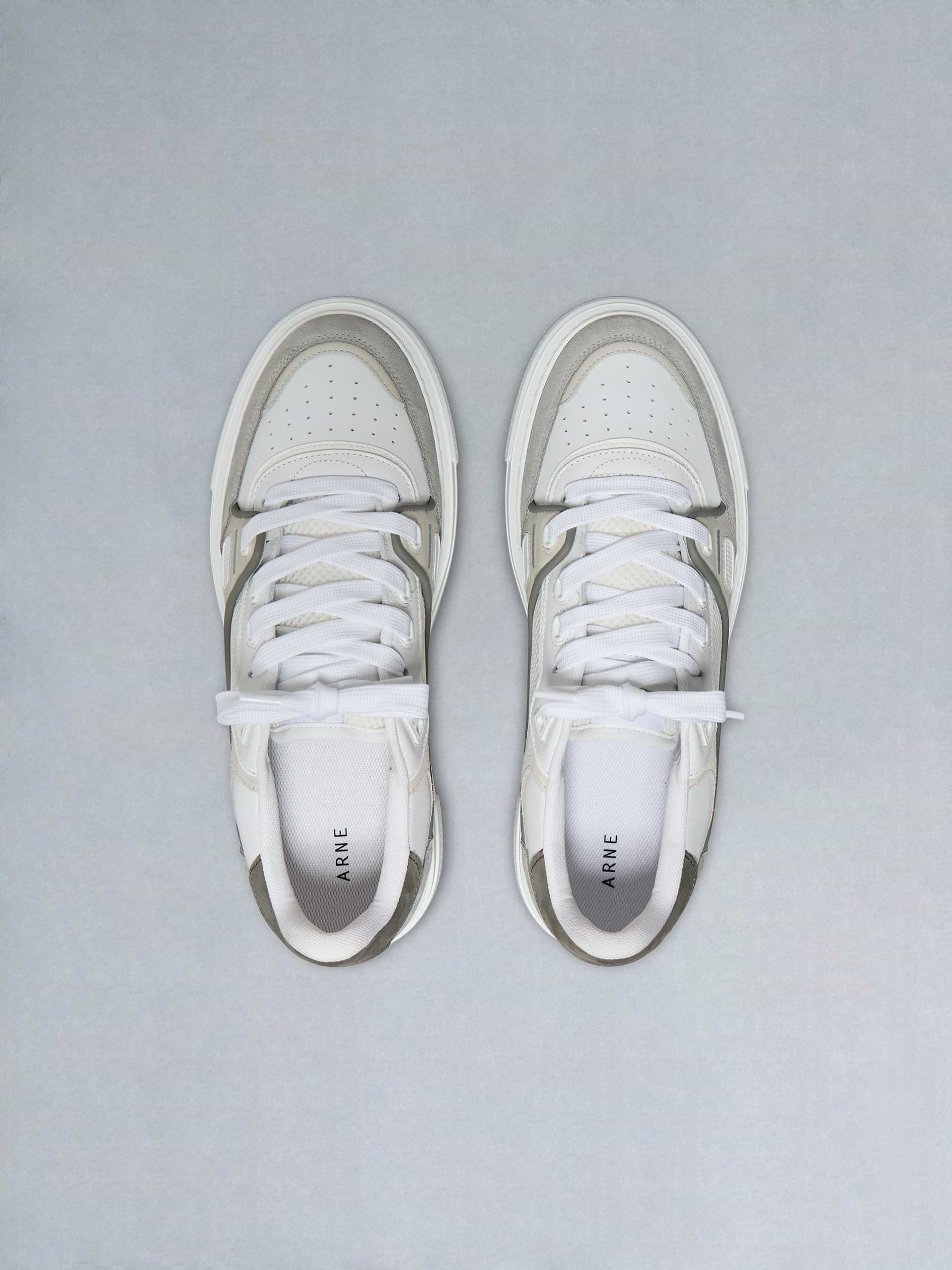 Atlas Trainer in White Stone